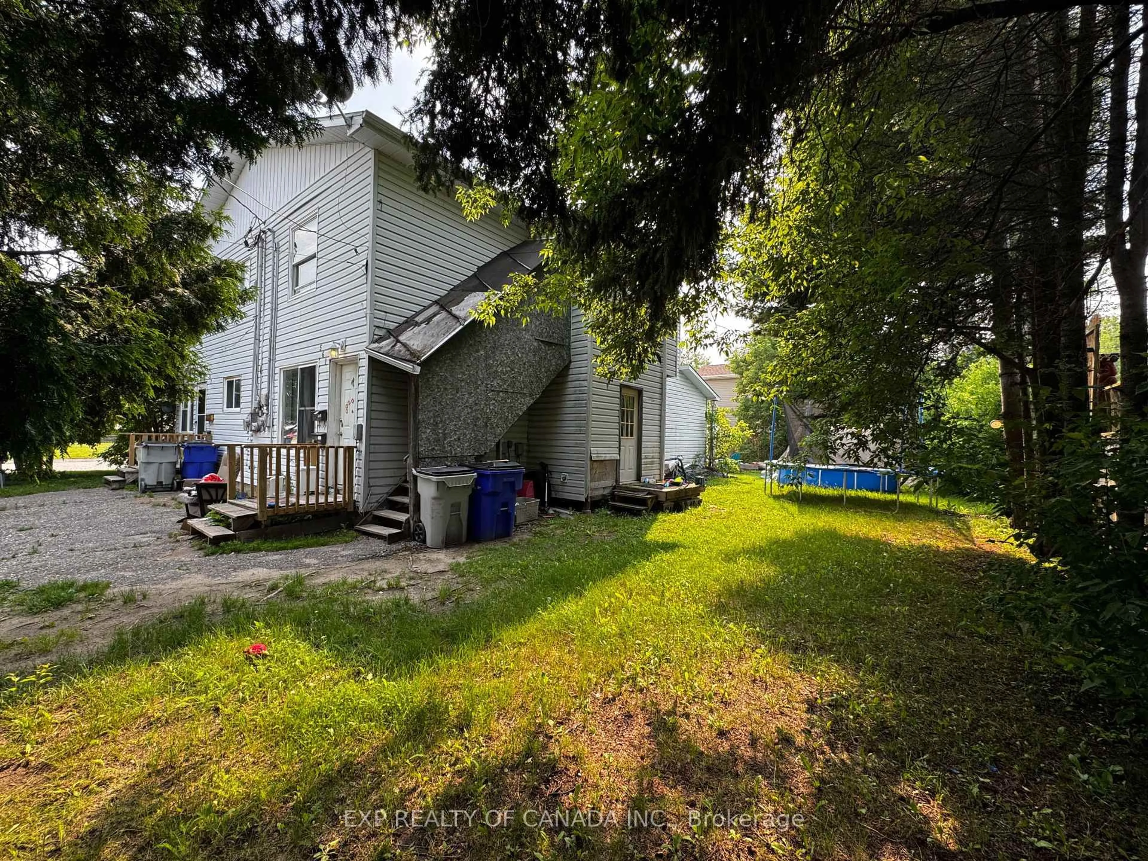 A pic from outside/outdoor area/front of a property/back of a property/a pic from drone, unknown for 557 Norman St, Timmins Ontario P4N 4C1