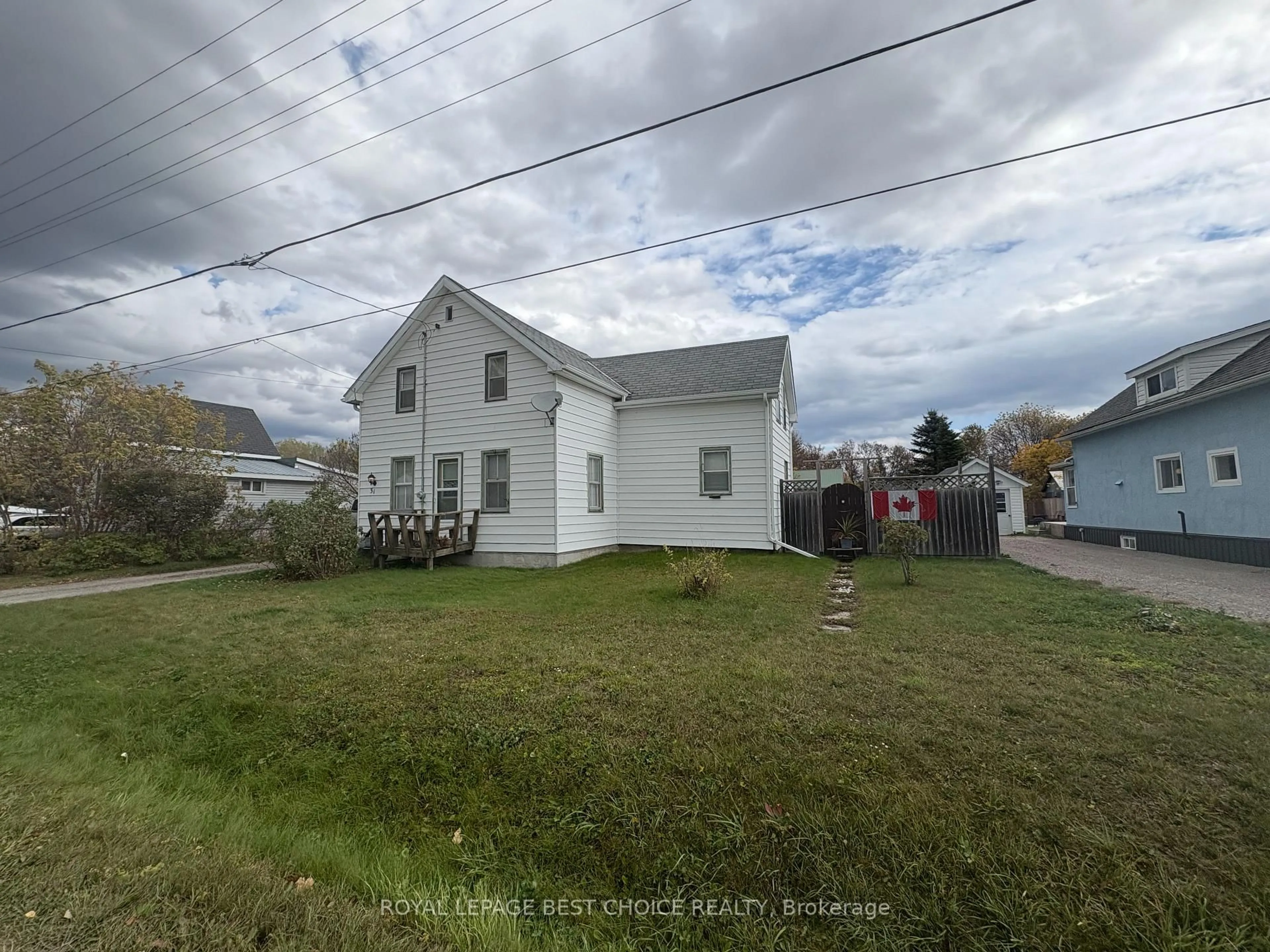 A pic from outside/outdoor area/front of a property/back of a property/a pic from drone, street for 31 First St, Englehart Ontario P0J 1H0