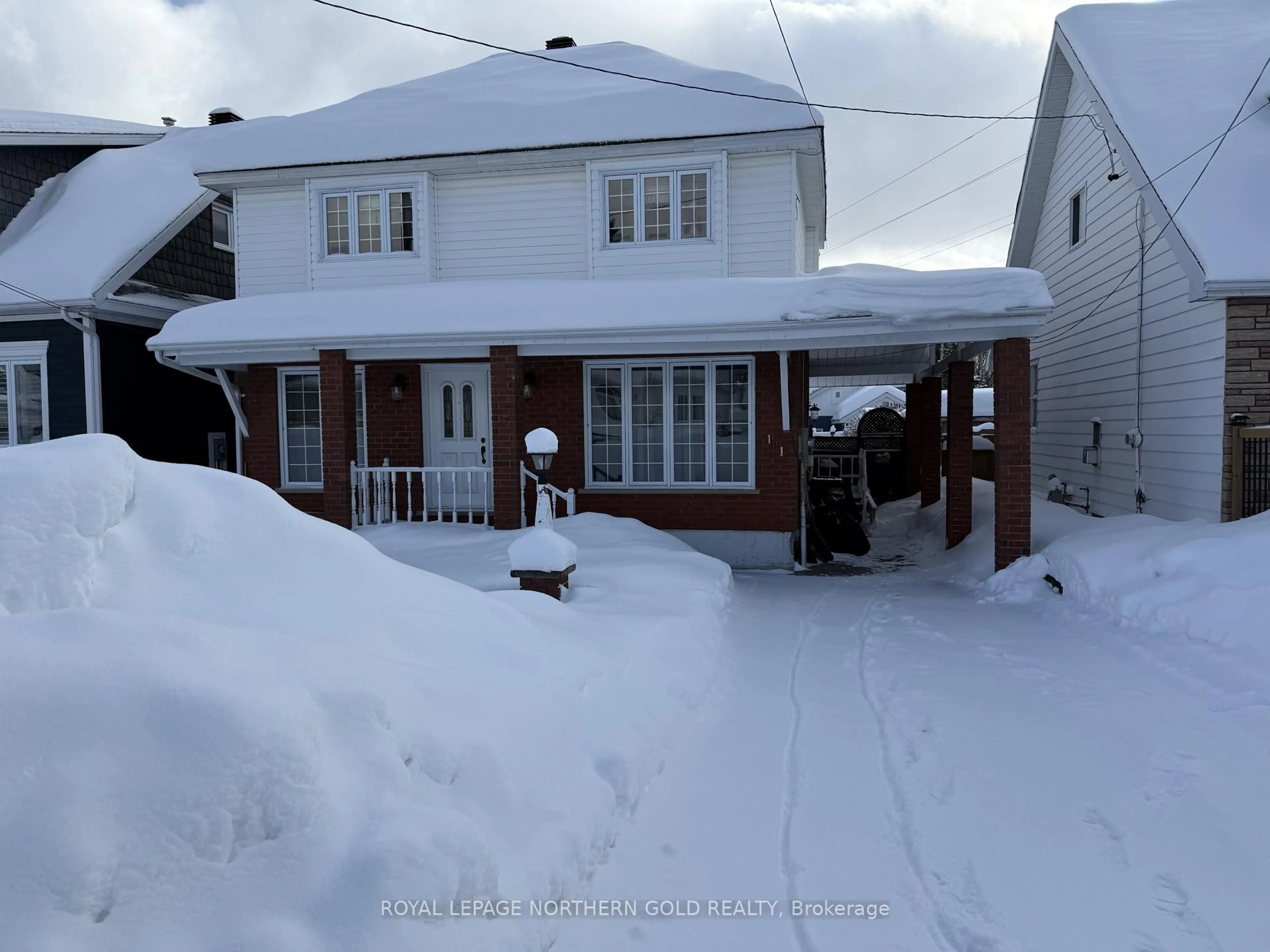 A pic from outside/outdoor area/front of a property/back of a property/a pic from drone, street for 101 First St, Kirkland Lake Ontario P2N 1N6