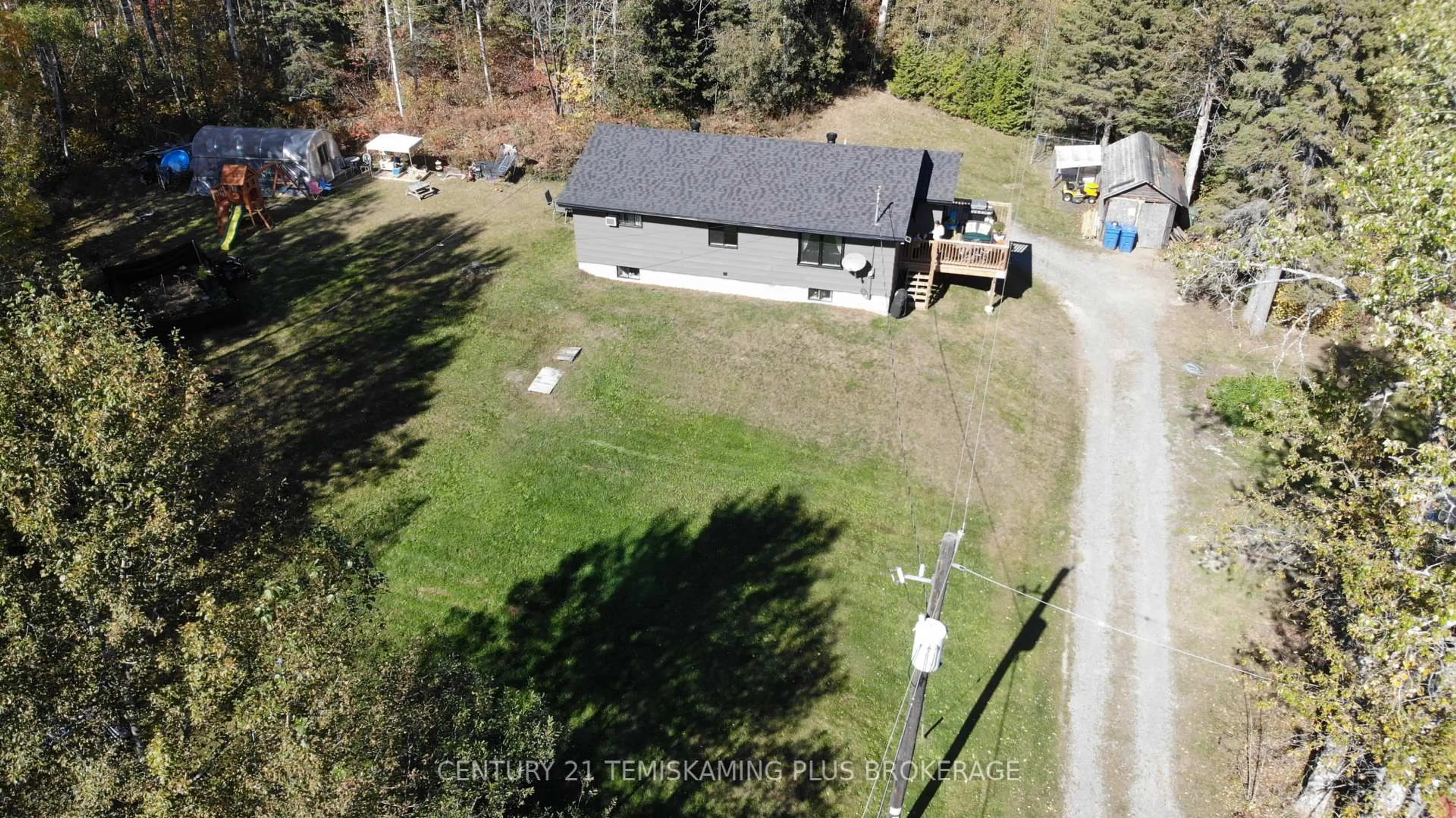 A pic from outside/outdoor area/front of a property/back of a property/a pic from drone, unknown for 466609 Kerr Lake Rd, Timiskaming Ontario P0J 1C0
