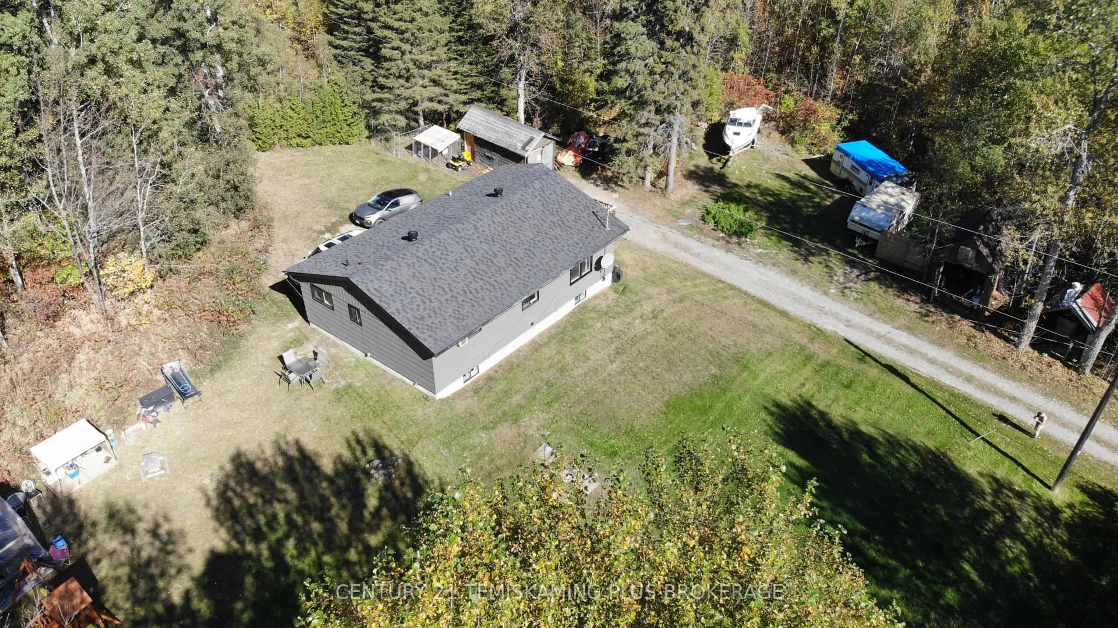 A pic from outside/outdoor area/front of a property/back of a property/a pic from drone, unknown for 466609 Kerr Lake Rd, Timiskaming Ontario P0J 1C0