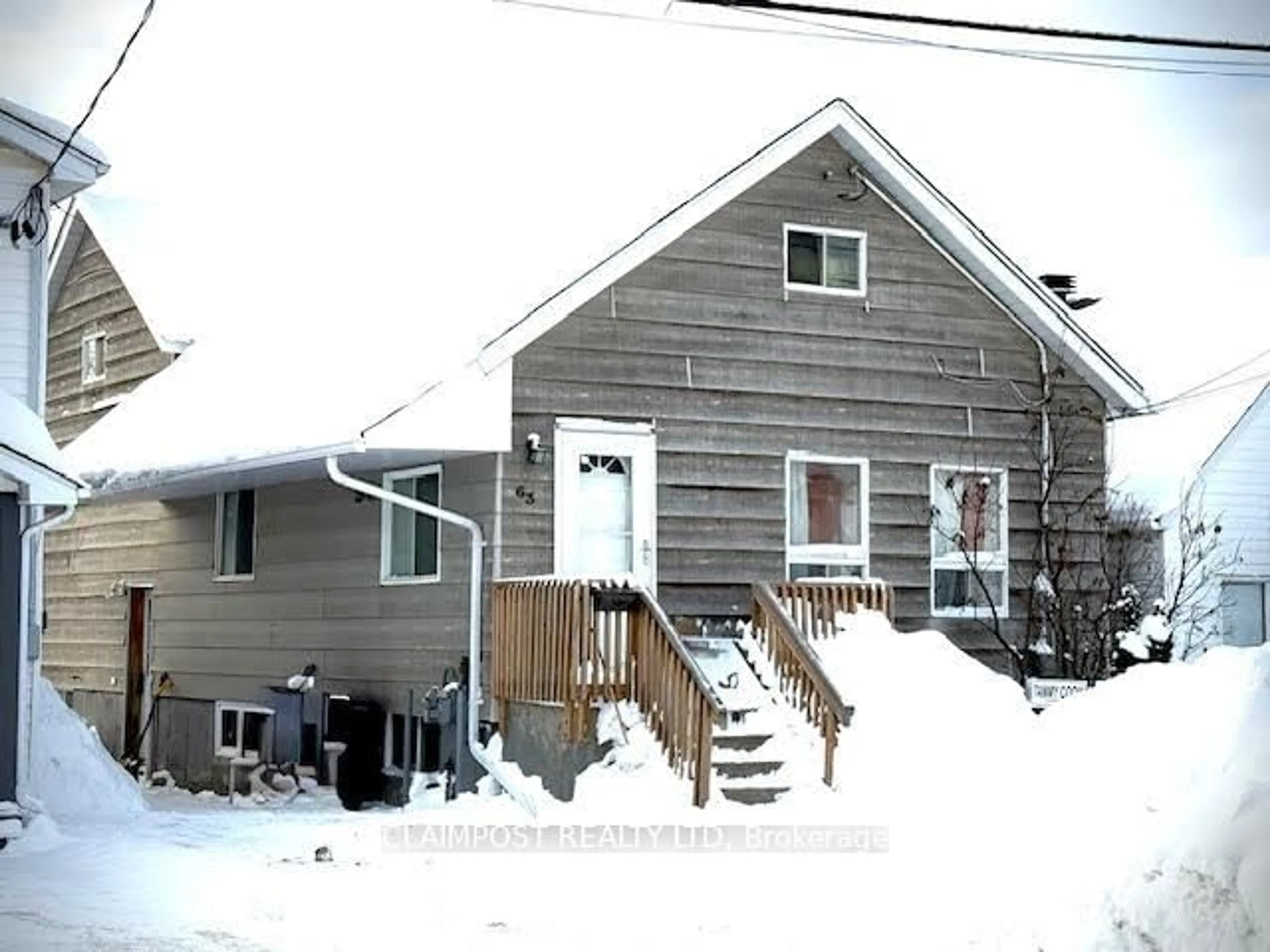Home with vinyl exterior material, street for 63 Rea St, Timmins Ontario P4N 4Z5