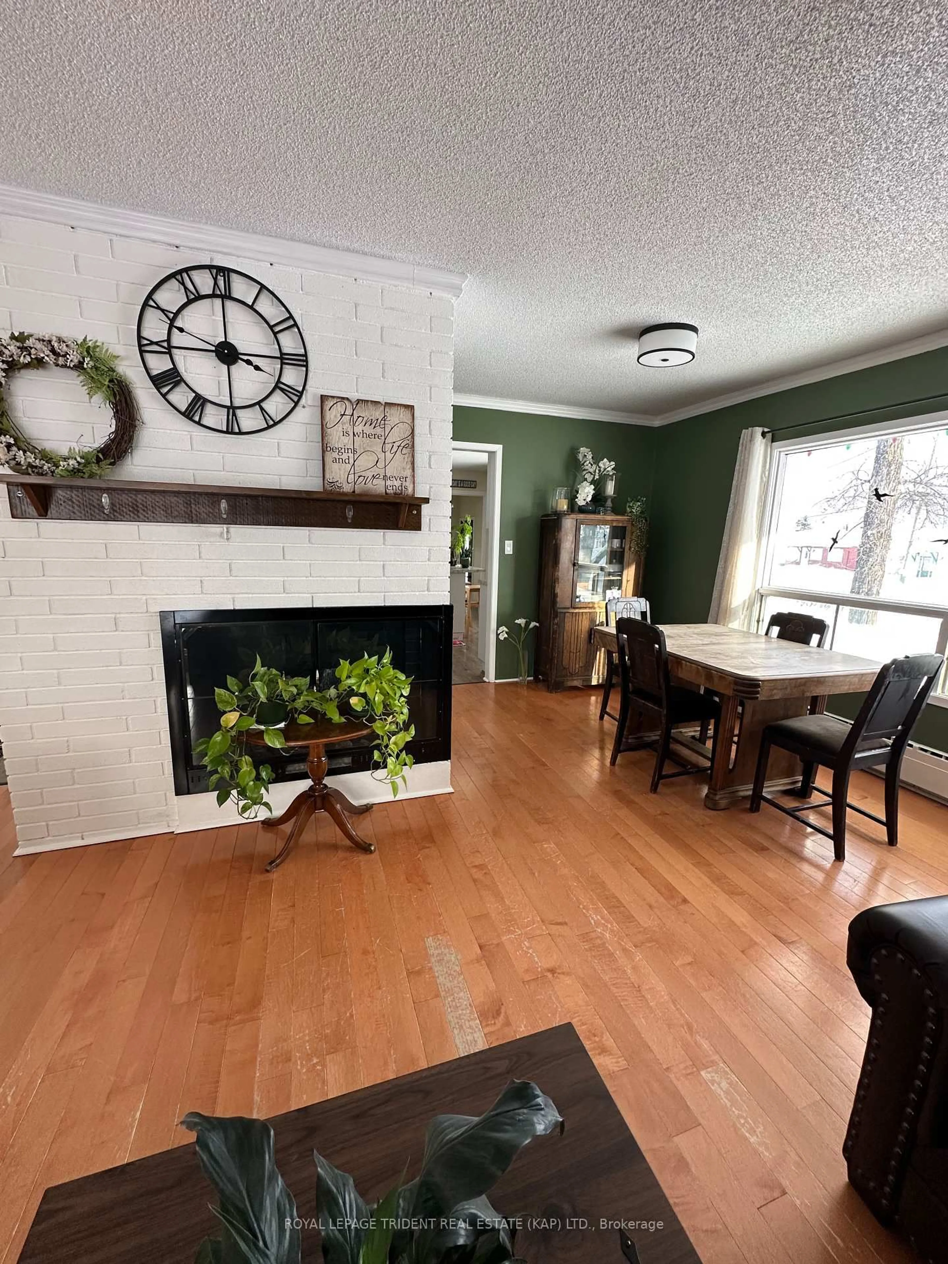 Living room with furniture, wood/laminate floor for 1 Superior St, Kapuskasing Ontario P5N 2C3