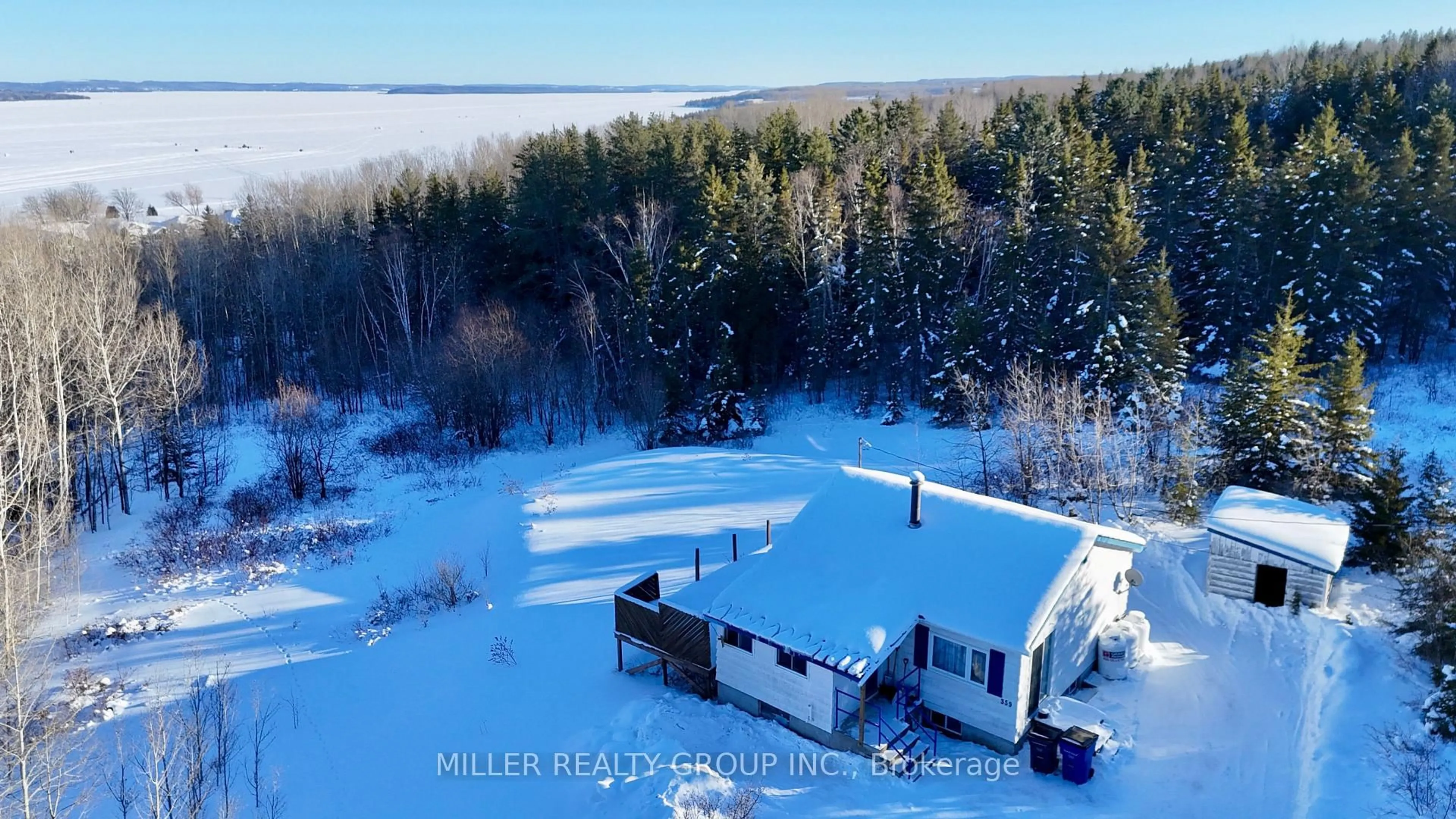A pic from outside/outdoor area/front of a property/back of a property/a pic from drone, water/lake/river/ocean view for 359 Nipissing Ave, Temiskaming Shores Ontario P0J 1P0