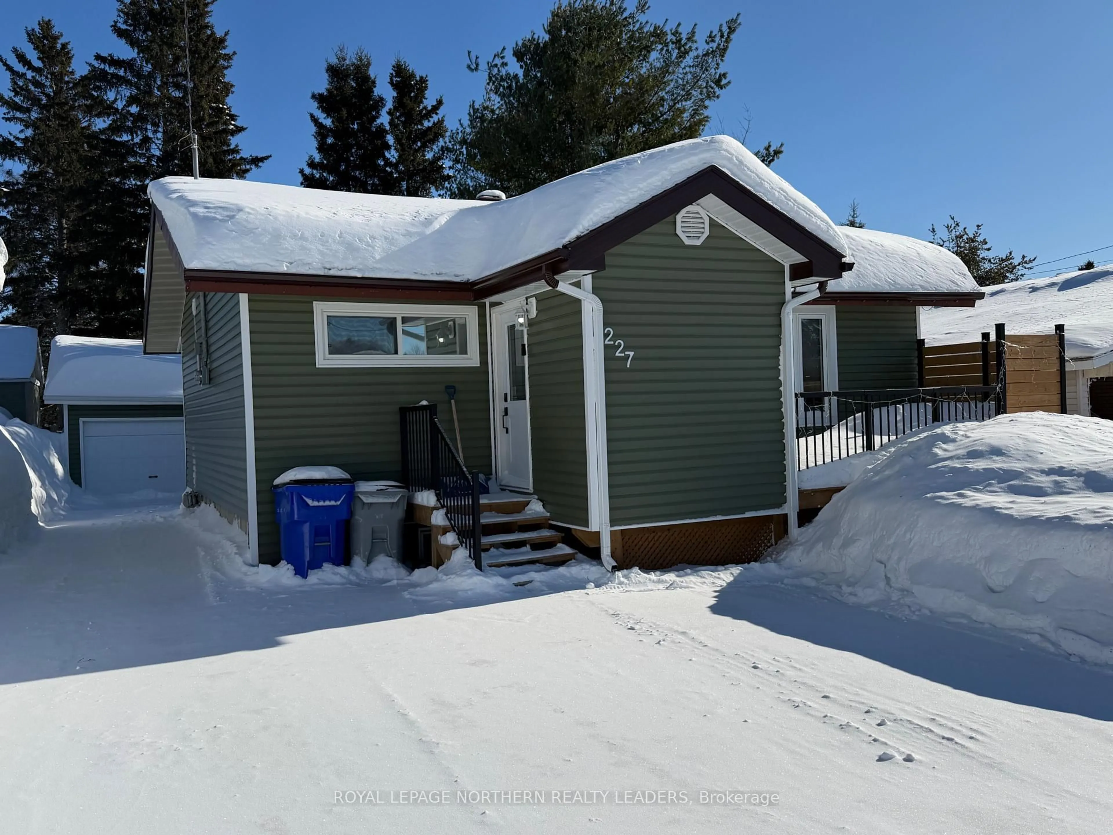 A pic from outside/outdoor area/front of a property/back of a property/a pic from drone, street for 227 Rekela St, Timmins Ontario P0N 1K0