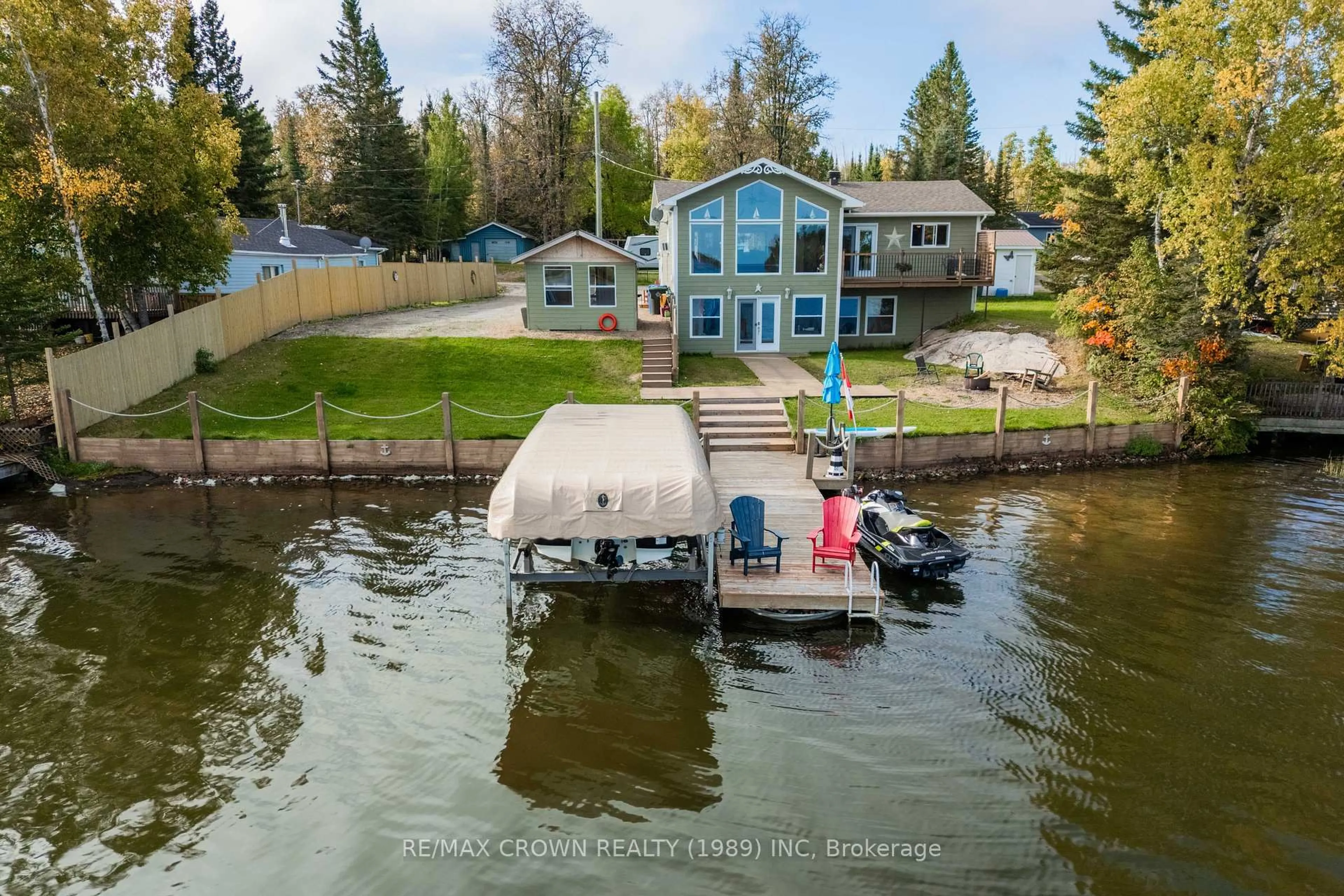 A pic from outside/outdoor area/front of a property/back of a property/a pic from drone, water/lake/river/ocean view for 161 Lefebvre Peninsula Rd #Moonbeam, Kapuskasing Ontario P0L 1V0