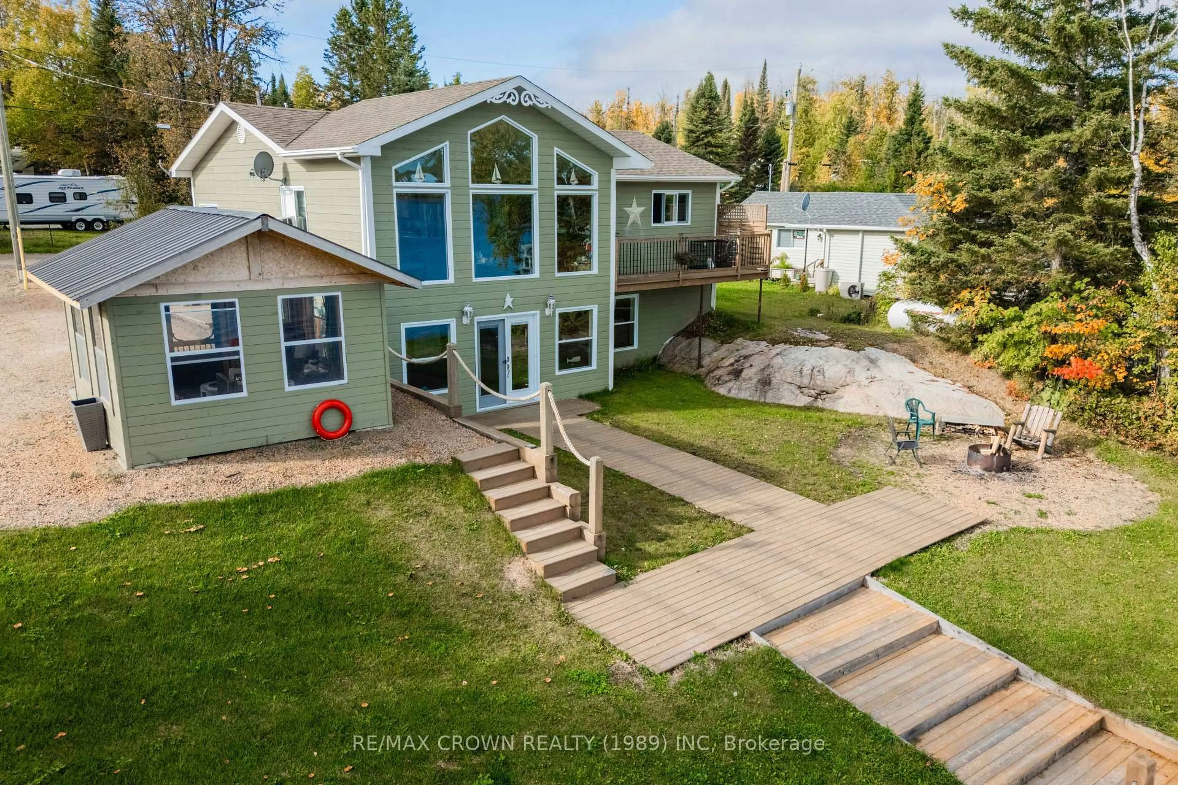 A pic from outside/outdoor area/front of a property/back of a property/a pic from drone, mountain view for 161 Lefebvre Peninsula Rd #Moonbeam, Kapuskasing Ontario P0L 1V0