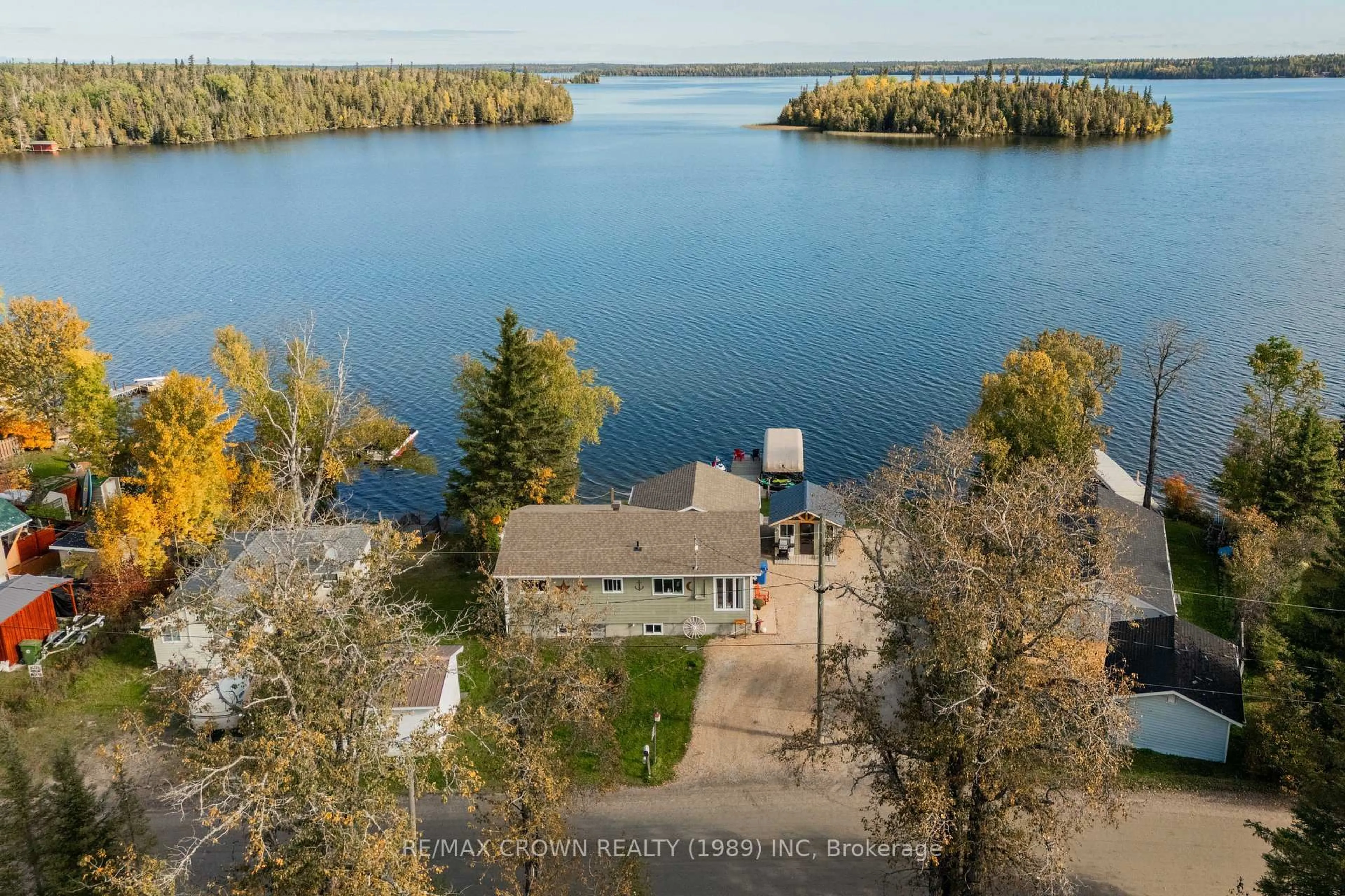 A pic from outside/outdoor area/front of a property/back of a property/a pic from drone, water/lake/river/ocean view for 161 Lefebvre Peninsula Rd #Moonbeam, Kapuskasing Ontario P0L 1V0