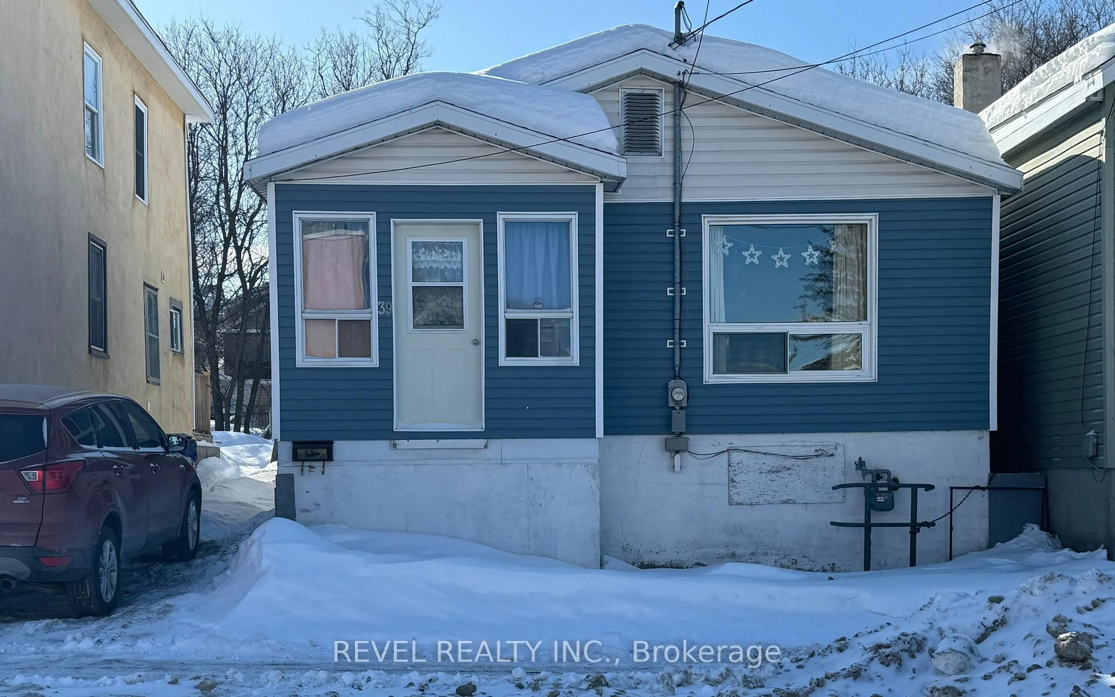 Home with vinyl exterior material, street for 39 Belanger Ave, Timmins Ontario P4N 2V2