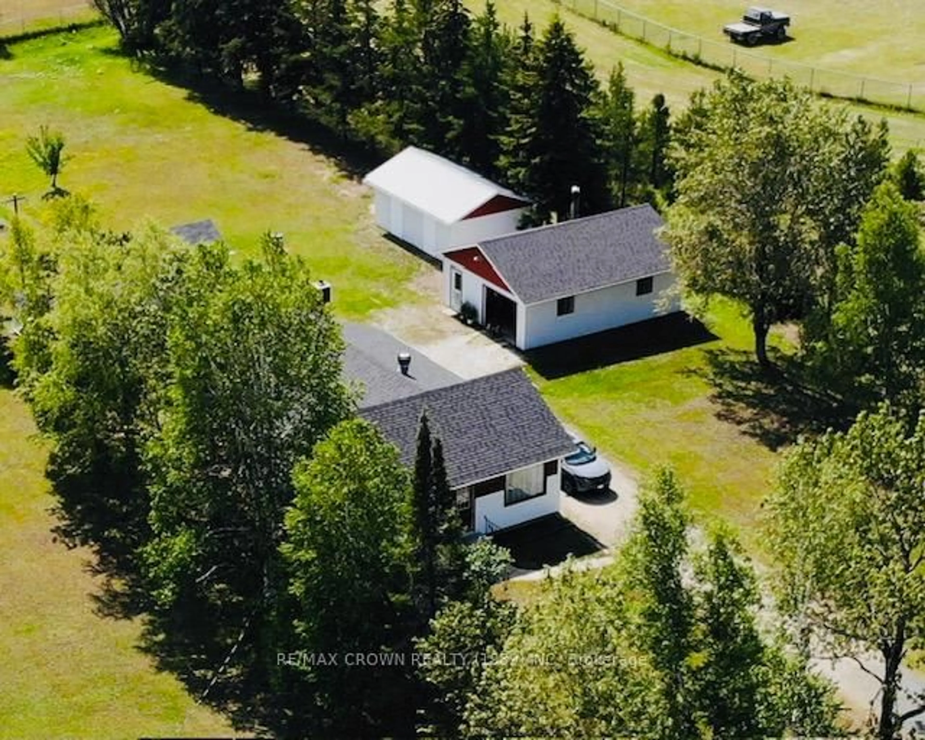 A pic from outside/outdoor area/front of a property/back of a property/a pic from drone, unknown for 123 HIGHWAY 583 Highway, Hearst Ontario P0L 1R0