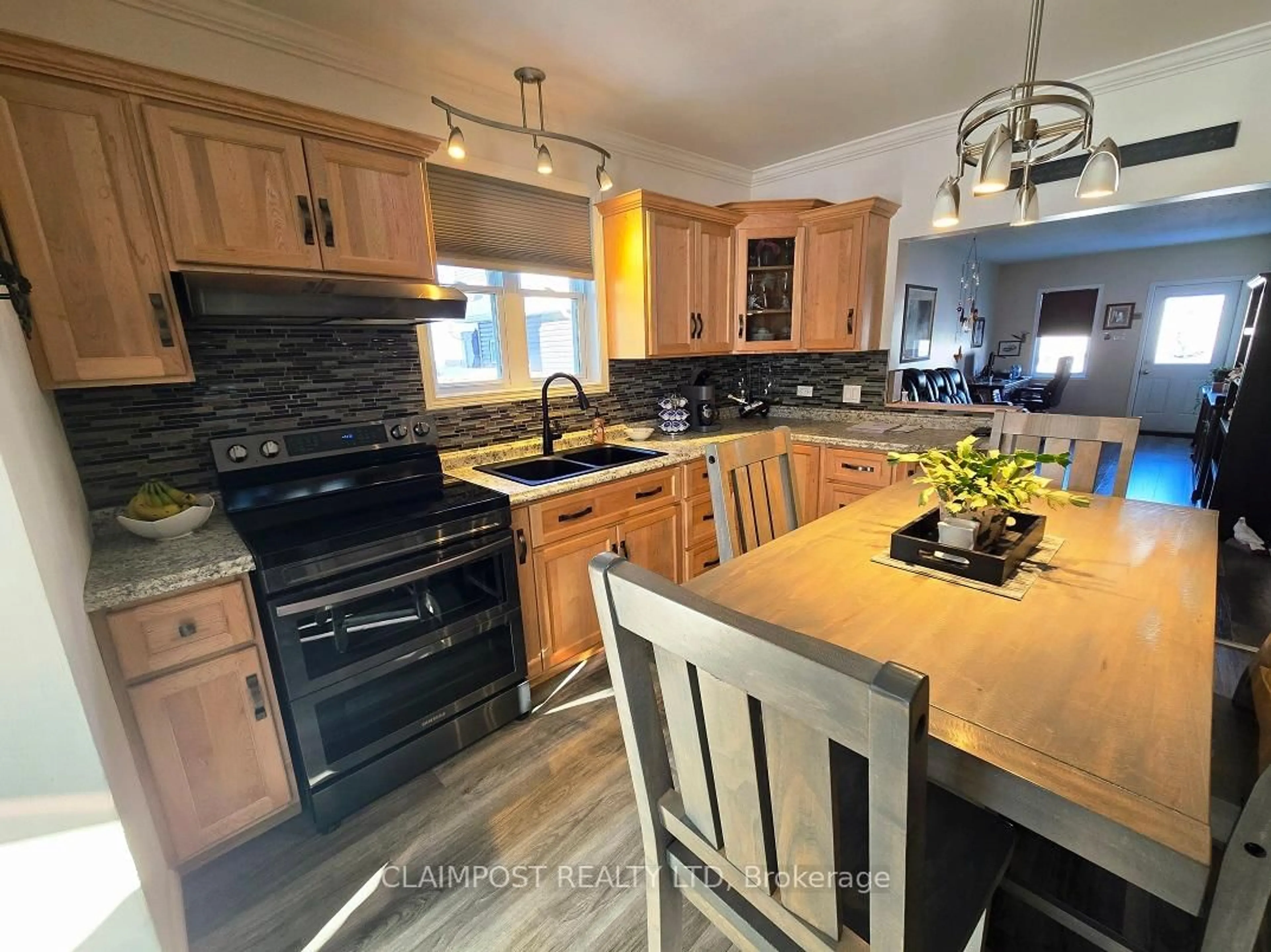 Contemporary kitchen, wood/laminate floor for 63 Kent Ave, Timmins Ontario P4N 3B7