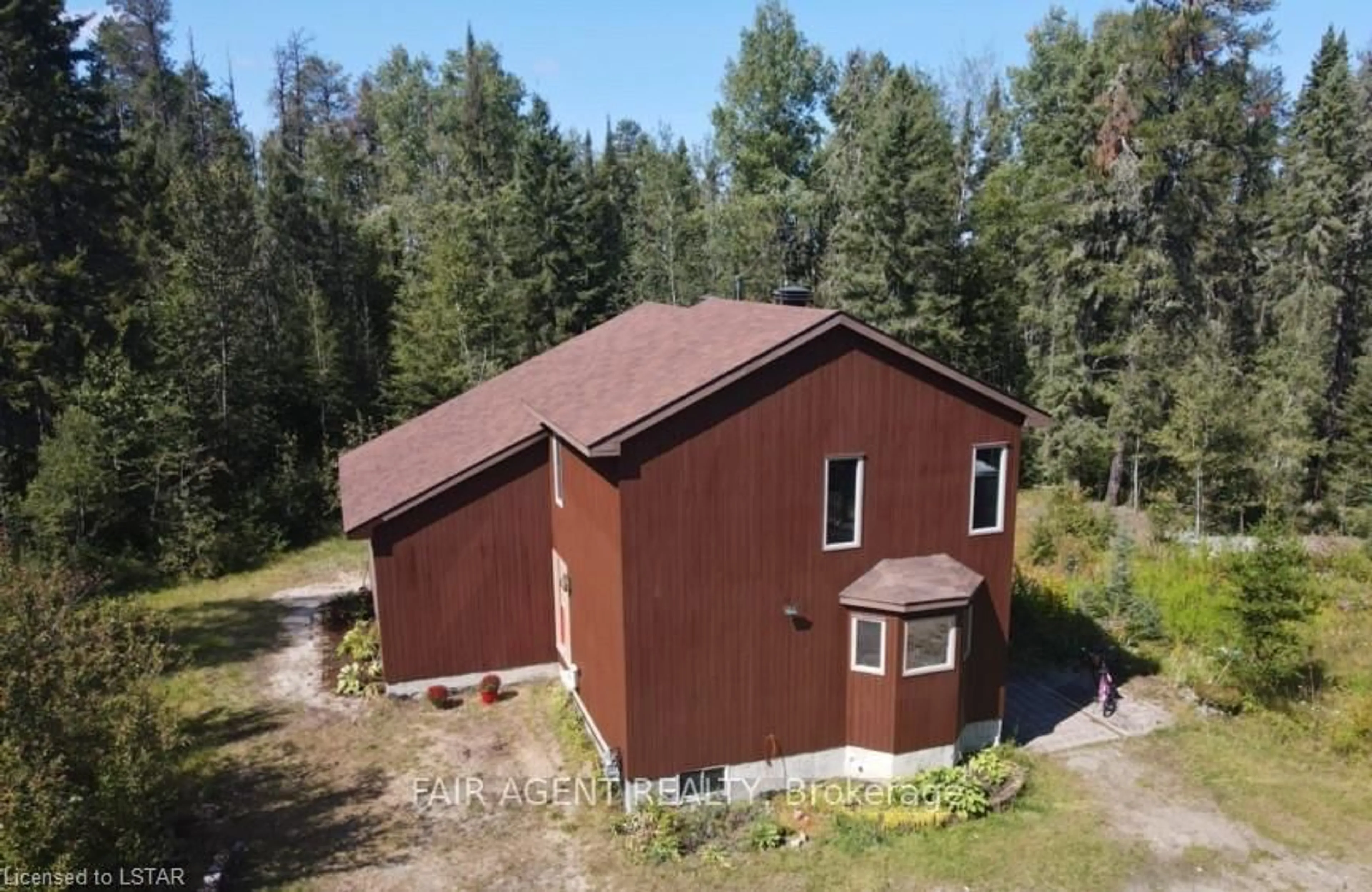 A pic from outside/outdoor area/front of a property/back of a property/a pic from drone, building for 810 LAFOREST Rd, Timmins Ontario P4P 7C7