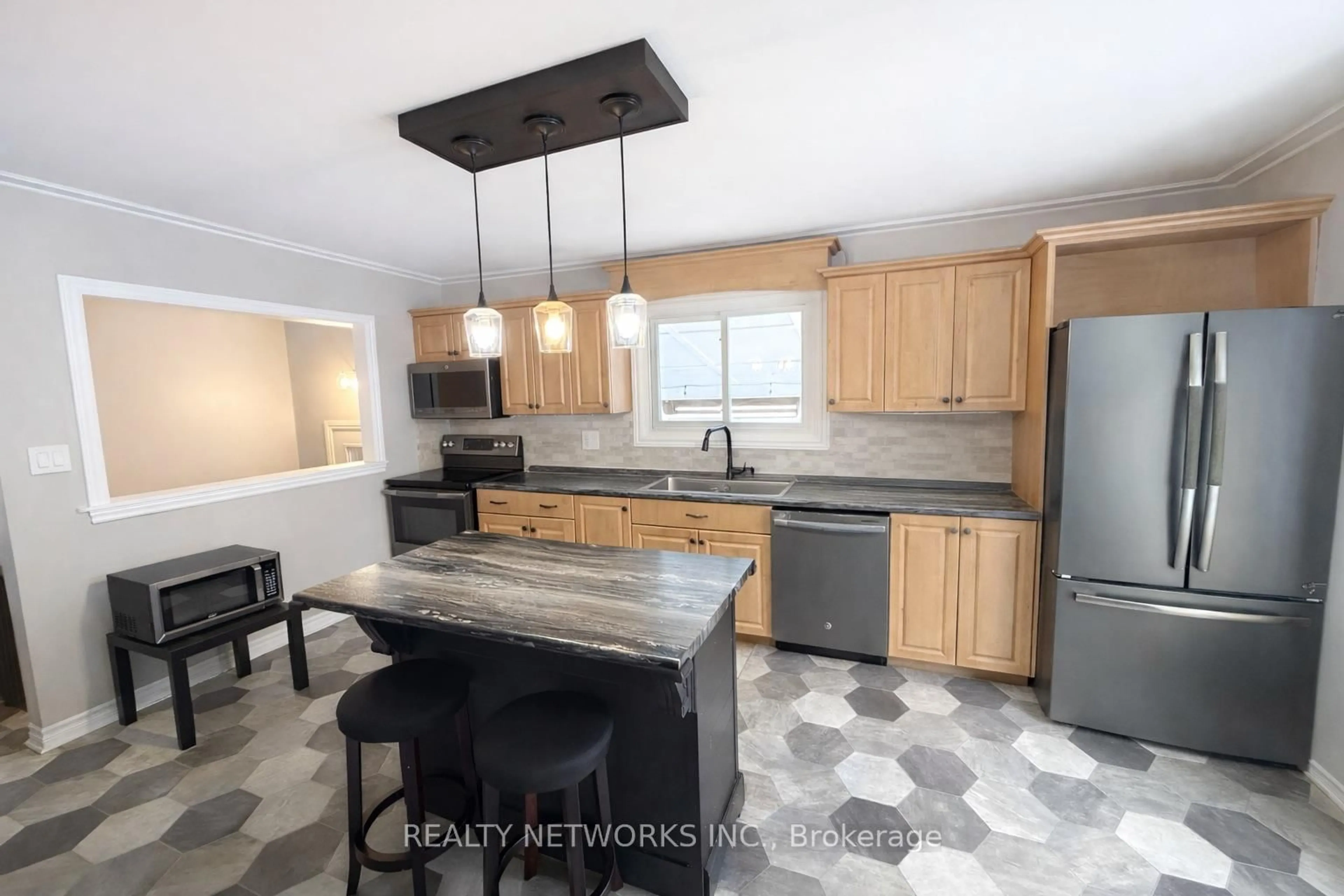 Open concept kitchen, ceramic/tile floor for 622 University St, Timmins Ontario P4N 5J3