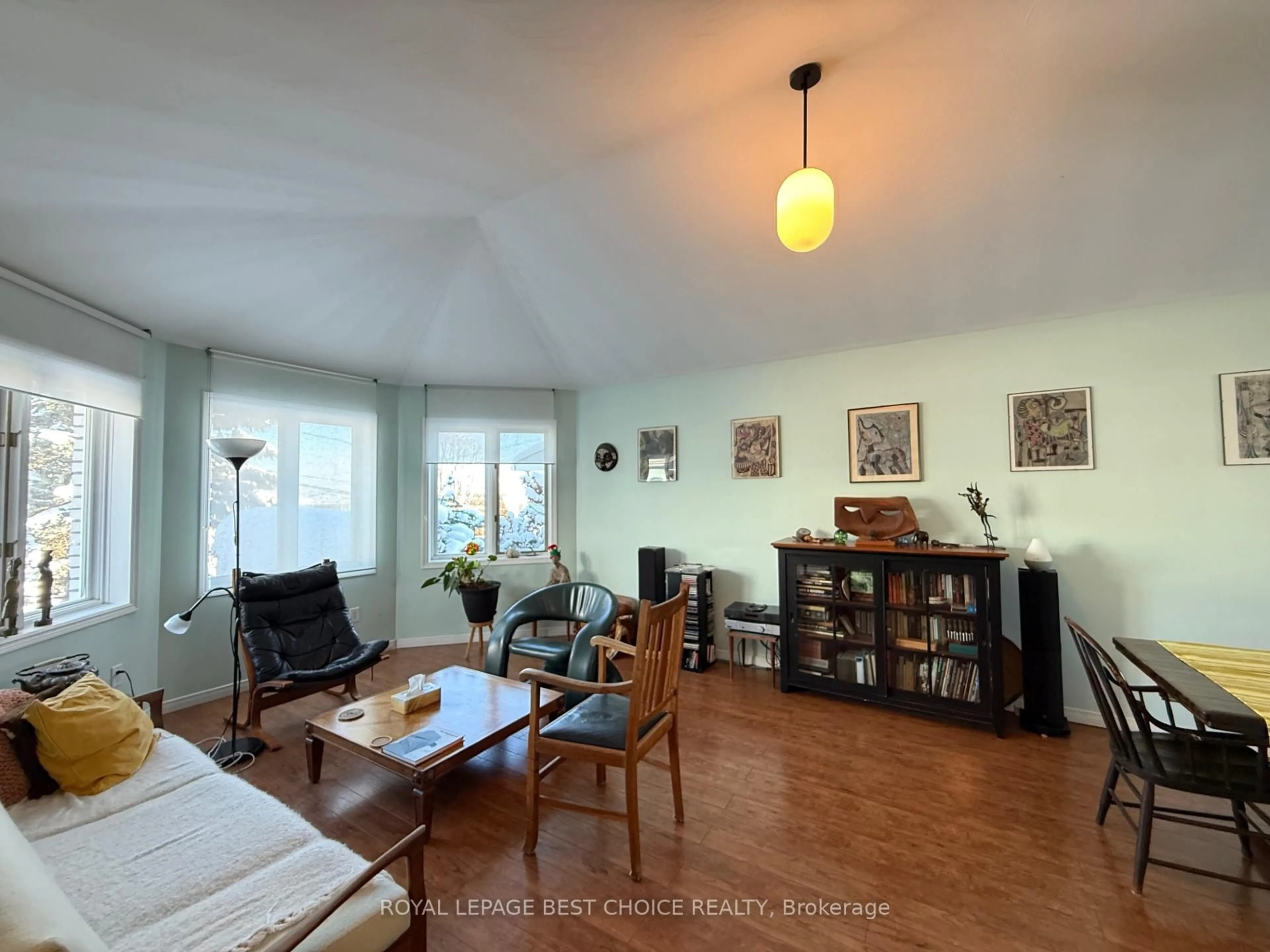 Living room with furniture, wood/laminate floor for 188 McKelvie St, Temiskaming Shores Ontario P0J 1P0