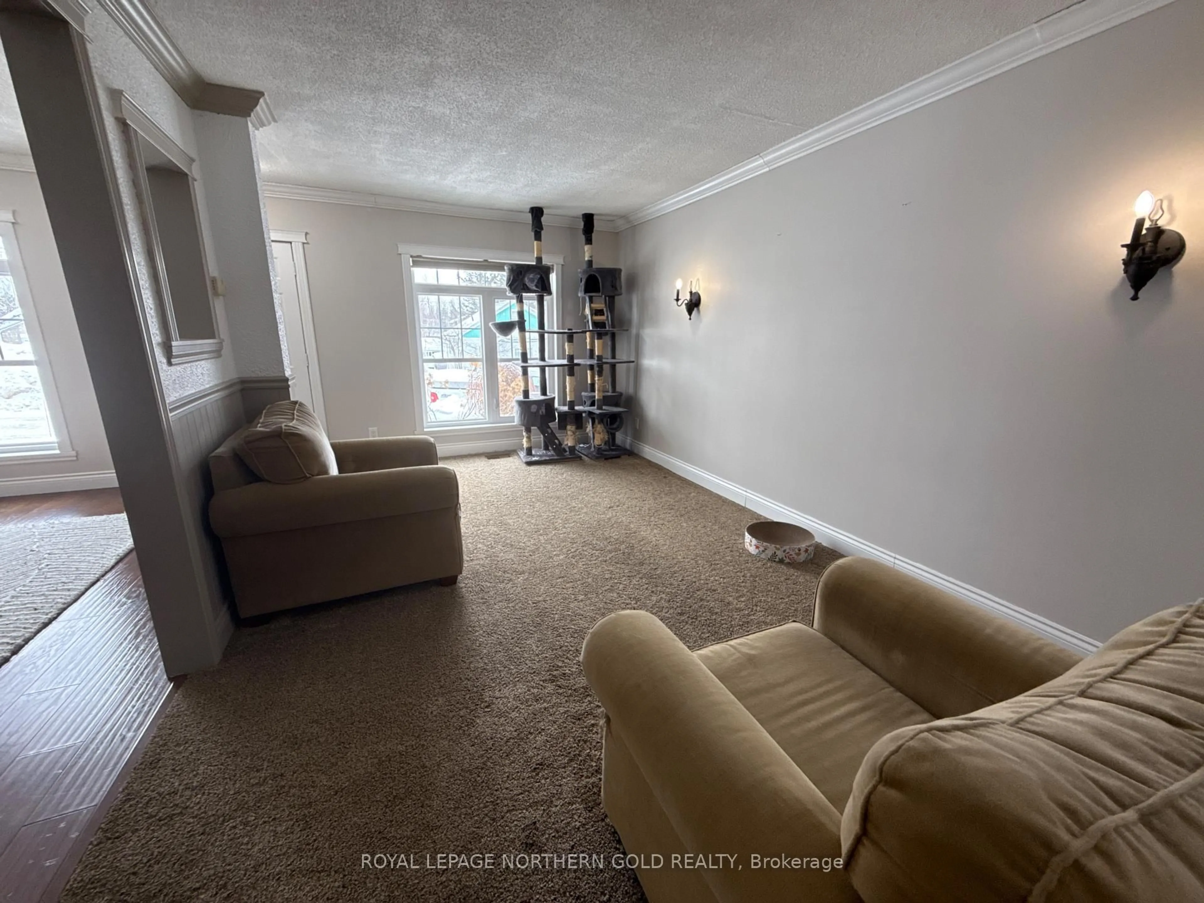 Living room with furniture, carpet floor for 104 Wishman St, Kirkland Lake Ontario P2N 1H1