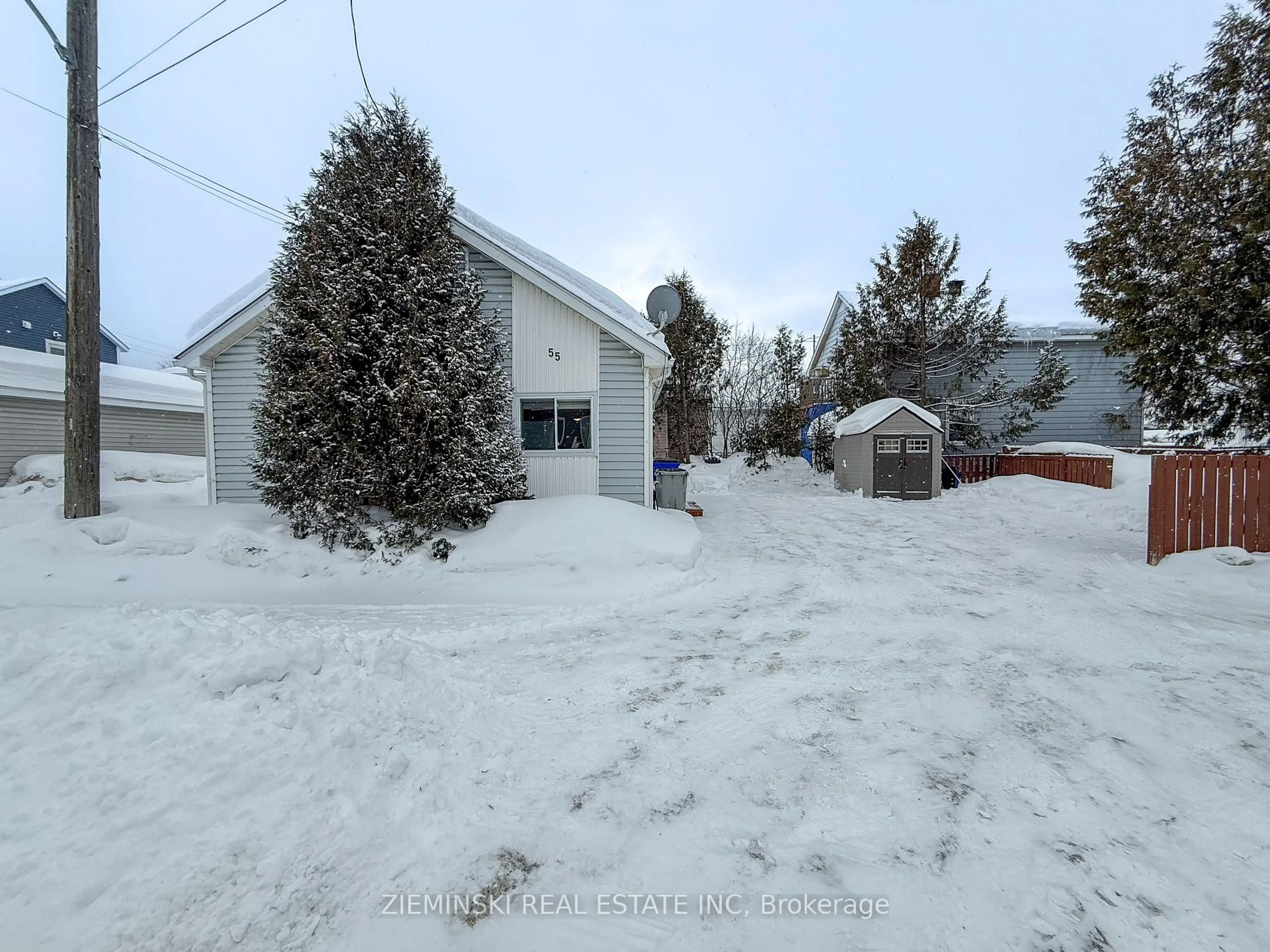 A pic from outside/outdoor area/front of a property/back of a property/a pic from drone, street for 55 Eighth Ave, Timmins Ontario P4N 5R2