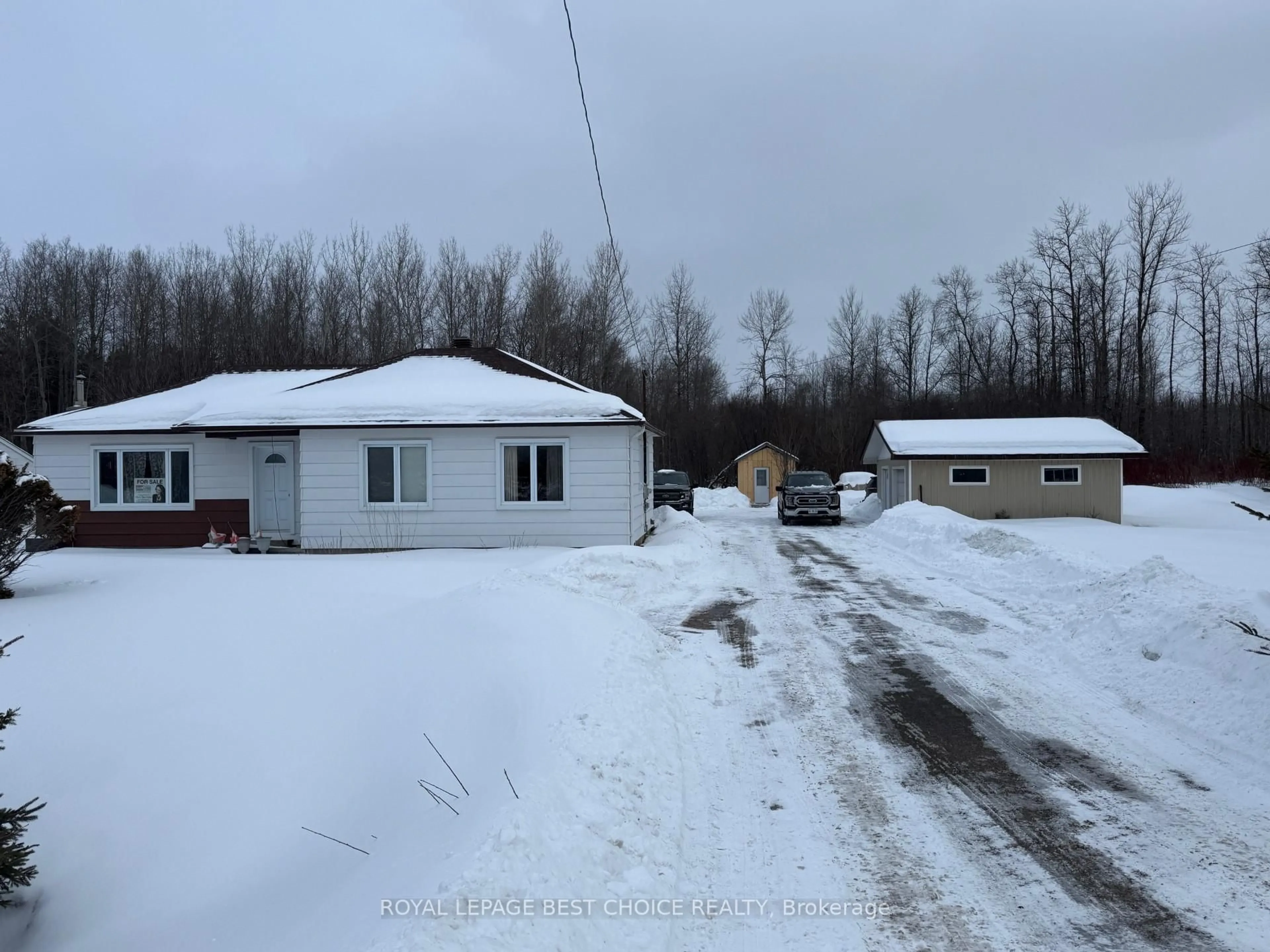 A pic from outside/outdoor area/front of a property/back of a property/a pic from drone, street for 334442 Highway 11 Highway, Englehart Ontario P0J 1H0