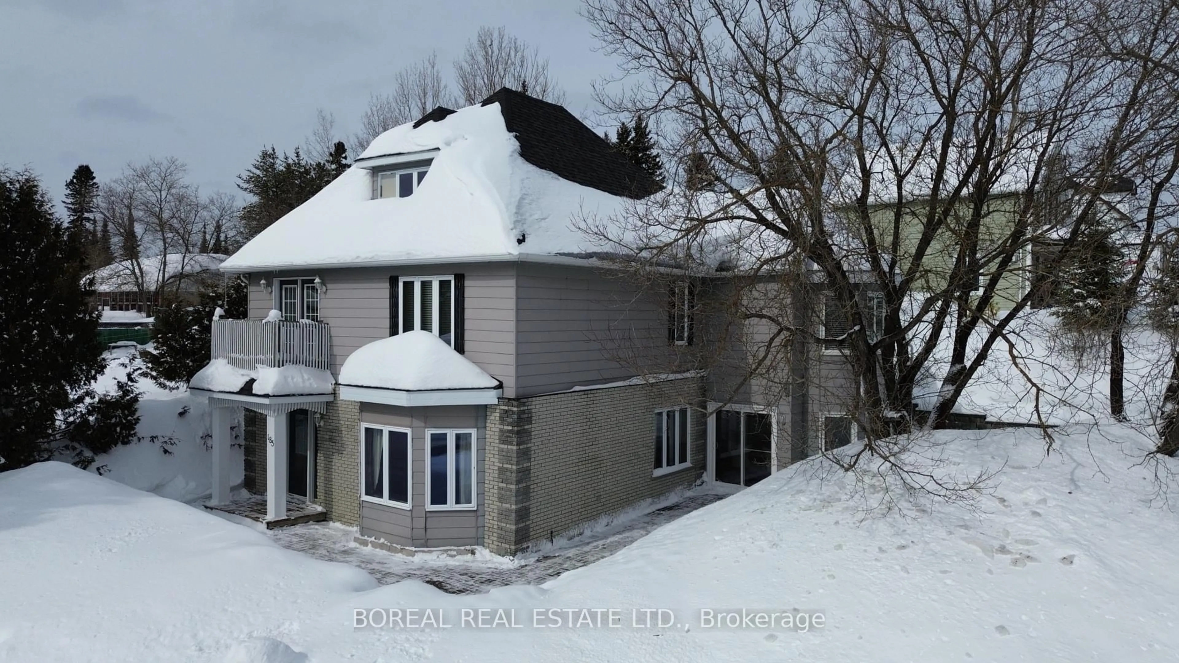 A pic from outside/outdoor area/front of a property/back of a property/a pic from drone, unknown for 185 Fifth St, Cochrane Ontario P0L 1C0