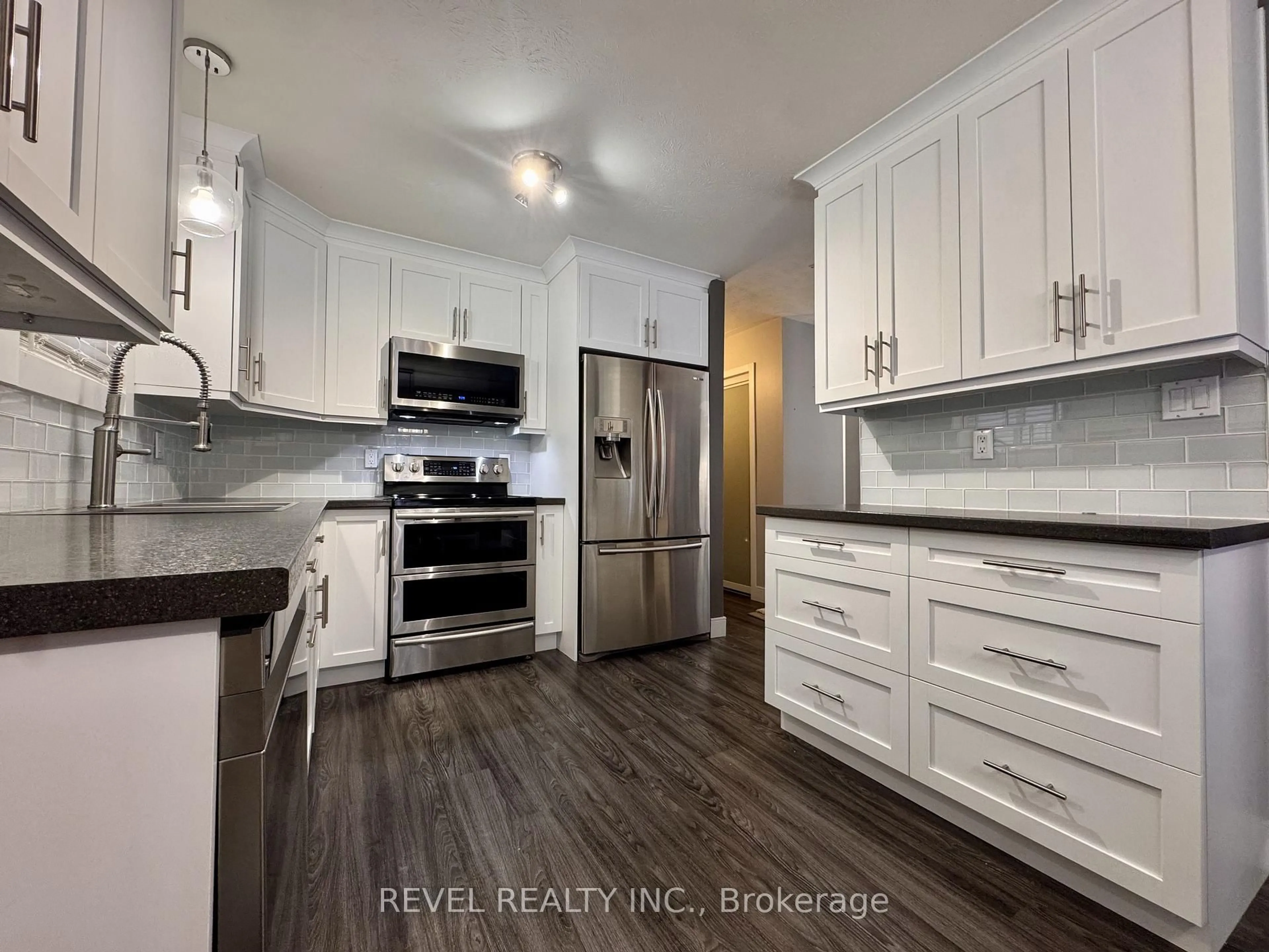 Open concept kitchen, unknown for 124 Shamrock Ave, Timmins Ontario P0N 1H0