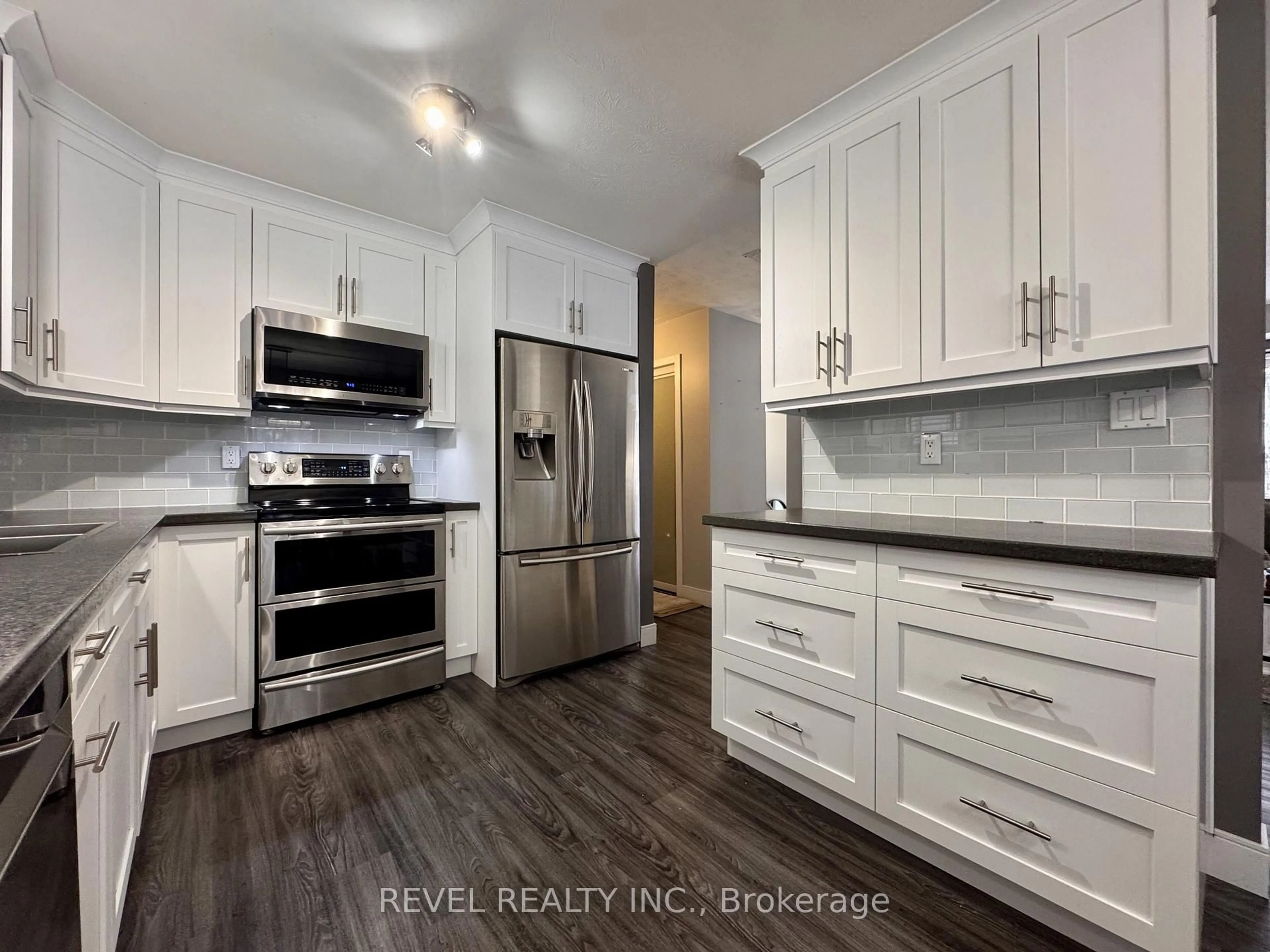 Open concept kitchen, unknown for 124 Shamrock Ave, Timmins Ontario P0N 1H0