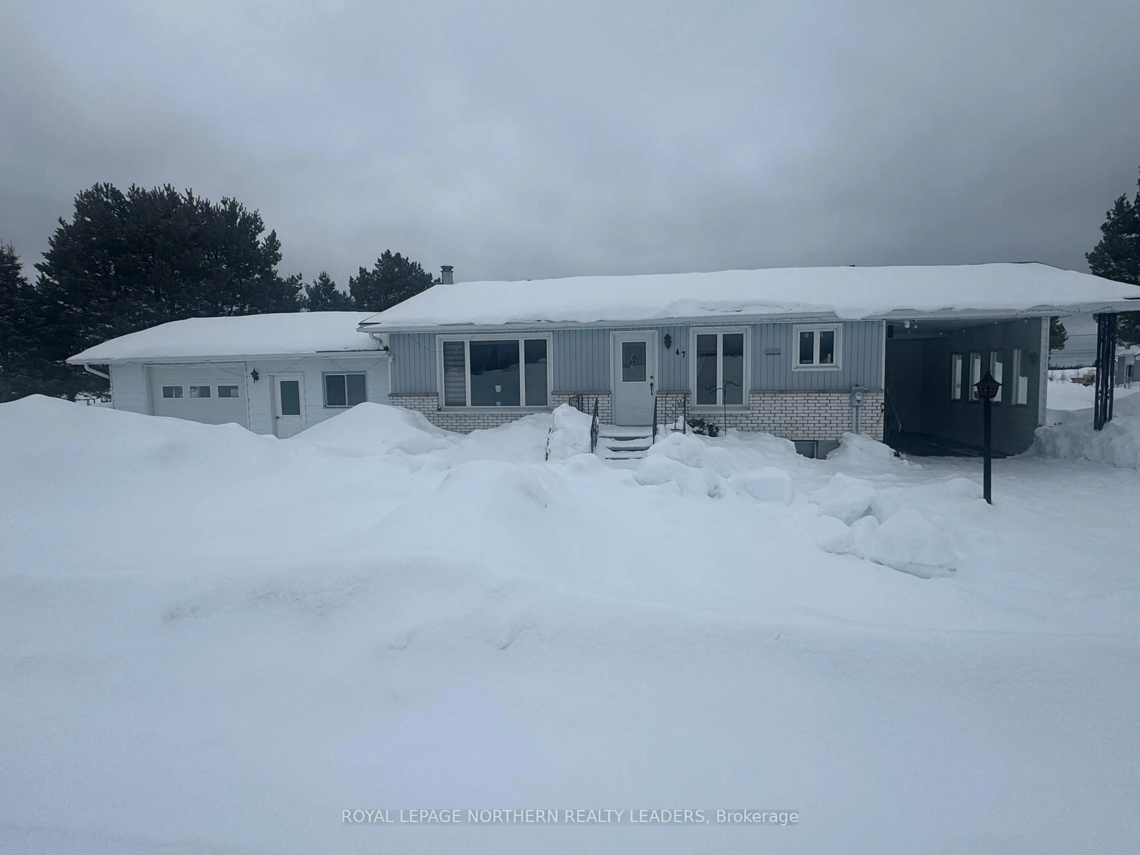 A pic from outside/outdoor area/front of a property/back of a property/a pic from drone, building for 47 Doyon St, Kapuskasing Ontario P0L 1G0