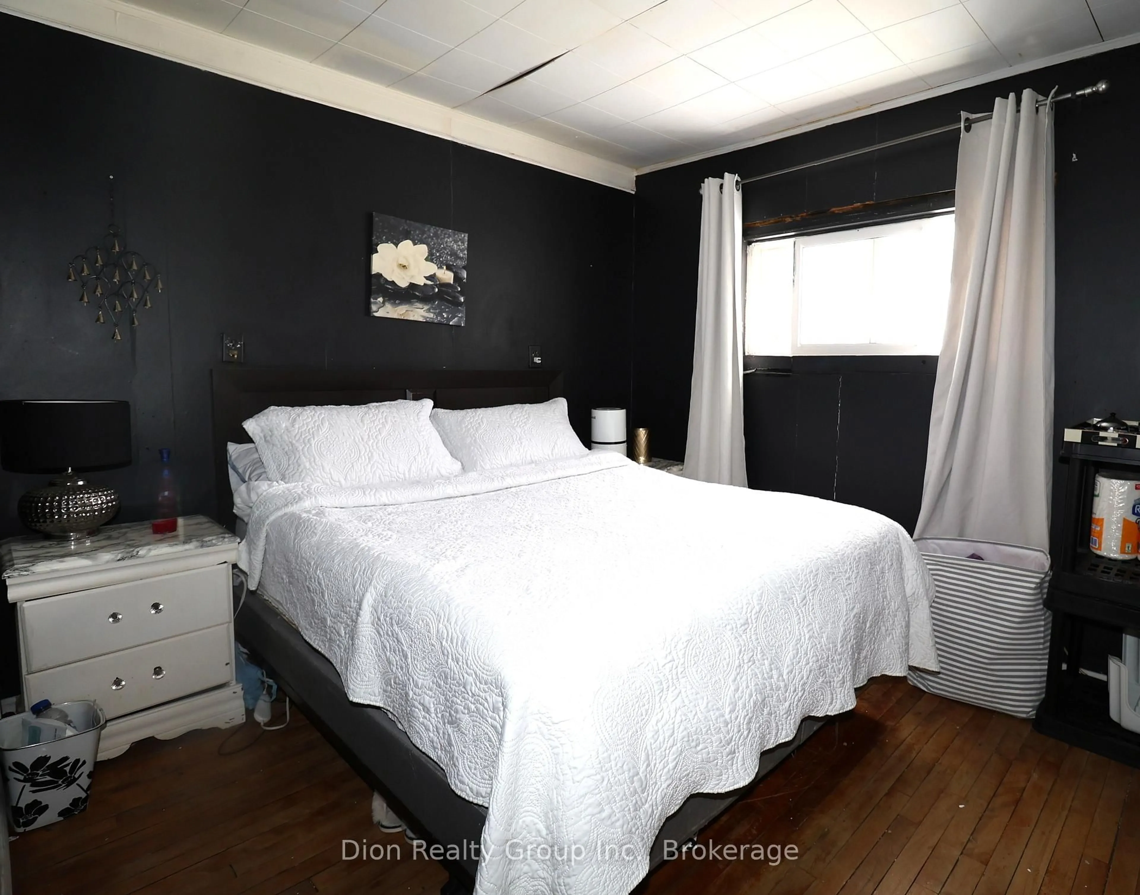 Bedroom with bed, wood/laminate floor for 17 Premier Ave, Kirkland Lake Ontario P2N 1W9