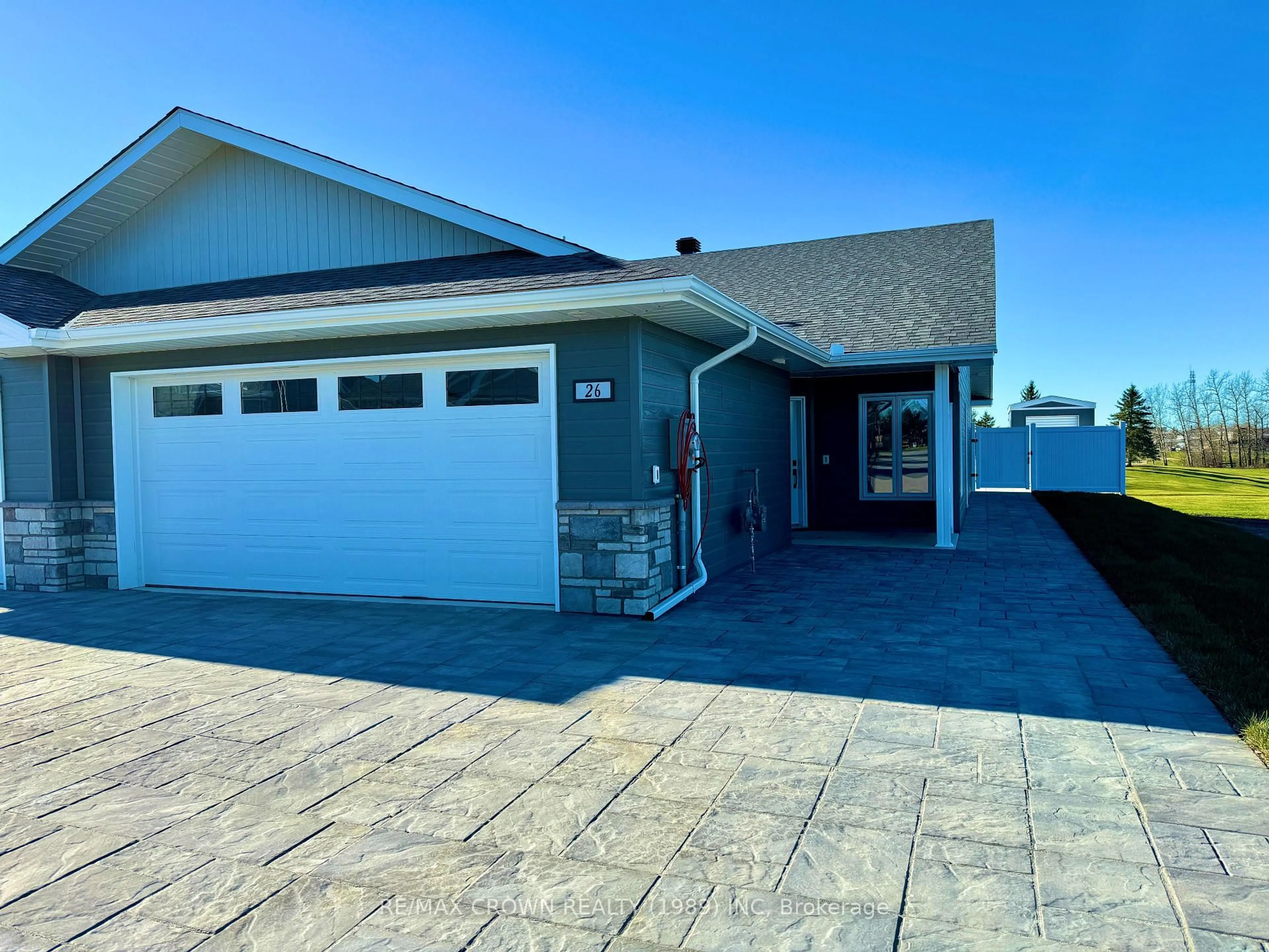 Home with vinyl exterior material, street for 26 Golf St, Kapuskasing Ontario P5N 3J6