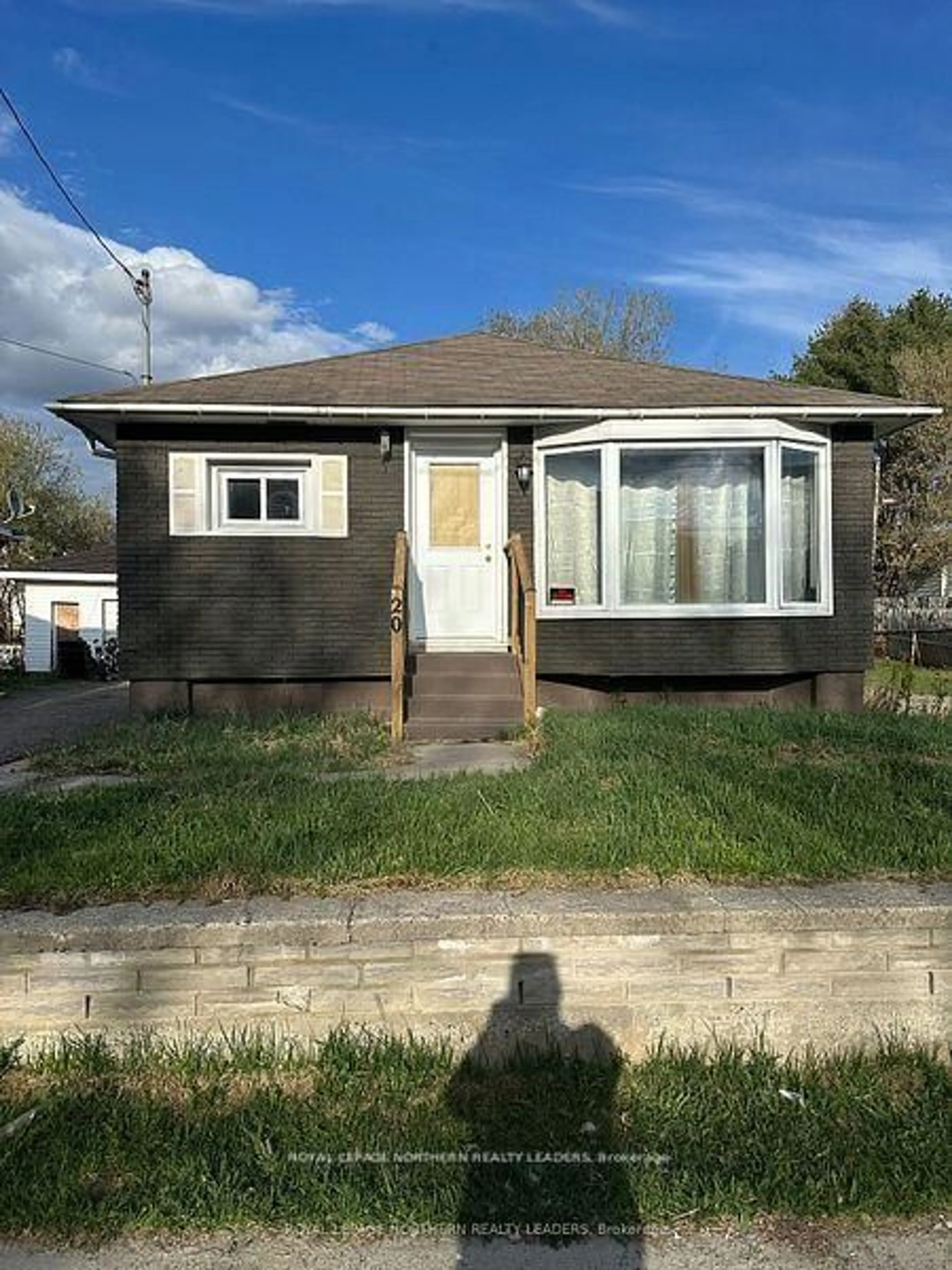 Home with vinyl exterior material, street for 20 O'Meara Blvd, Kirkland Lake Ontario P2N 2T6