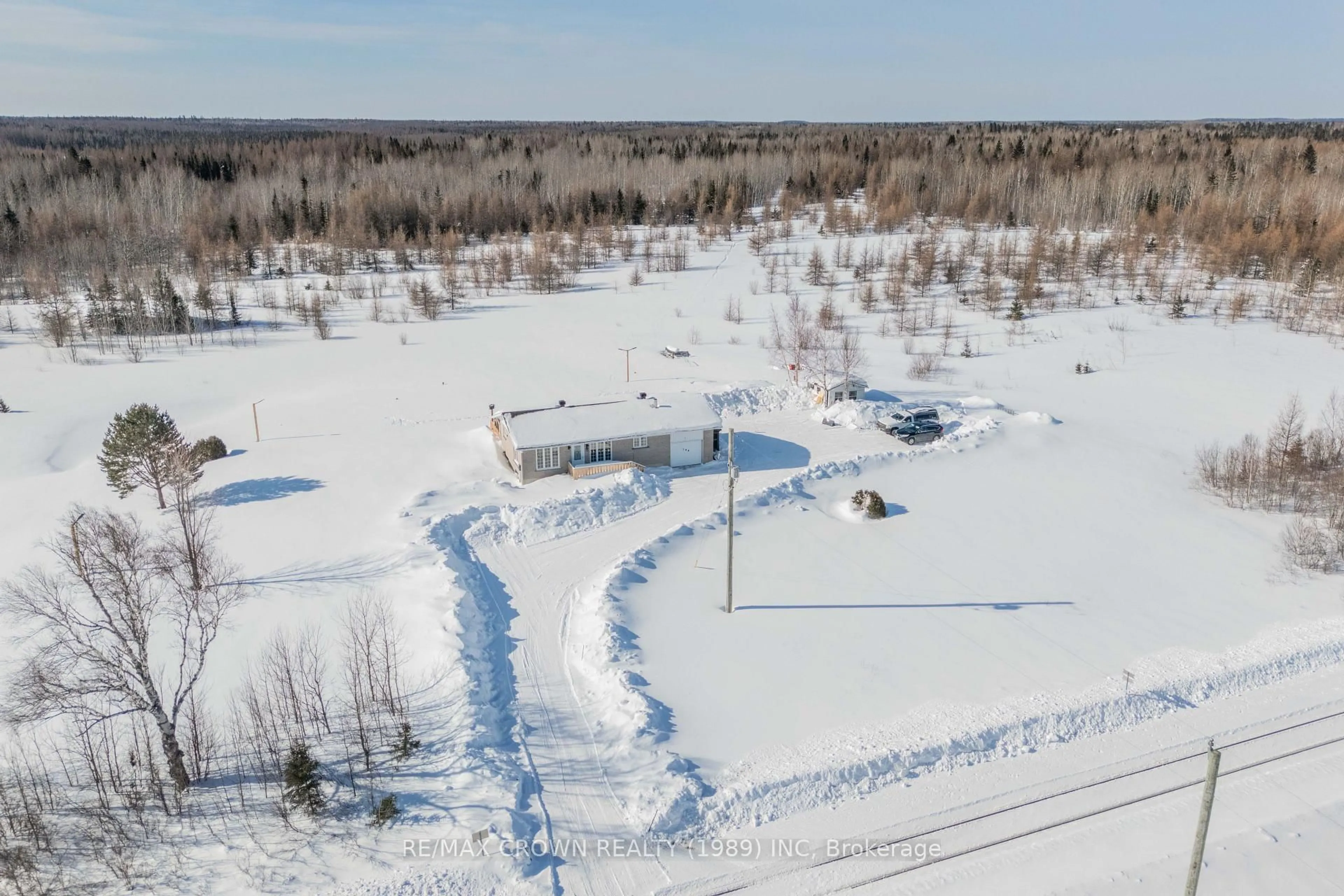 A pic from outside/outdoor area/front of a property/back of a property/a pic from drone, unknown for 194 Highway 11 #Fauquier, Kapuskasing Ontario P0L 1G0
