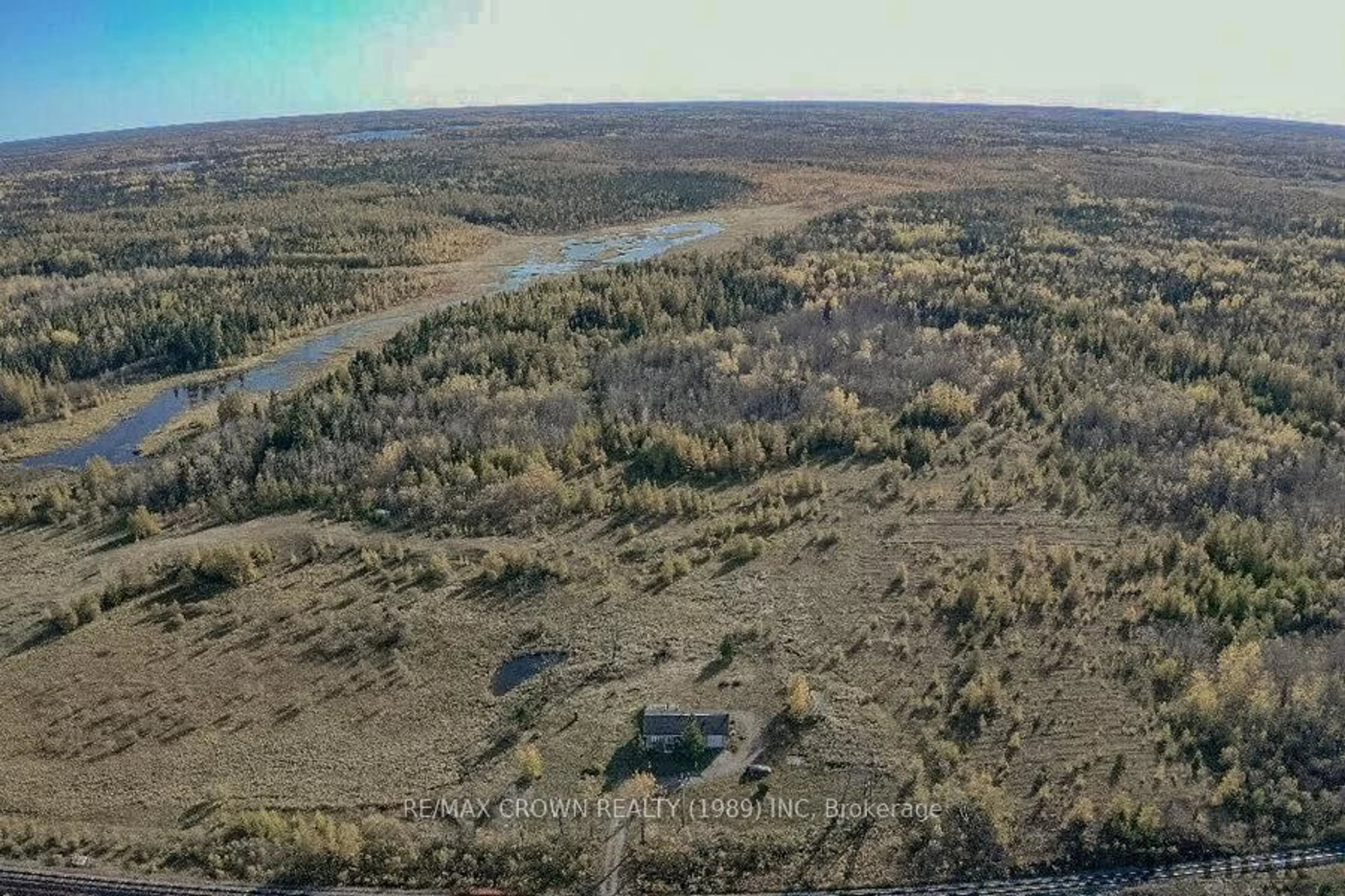 A pic from outside/outdoor area/front of a property/back of a property/a pic from drone, water/lake/river/ocean view for 194 Highway 11 #Fauquier, Kapuskasing Ontario P0L 1G0