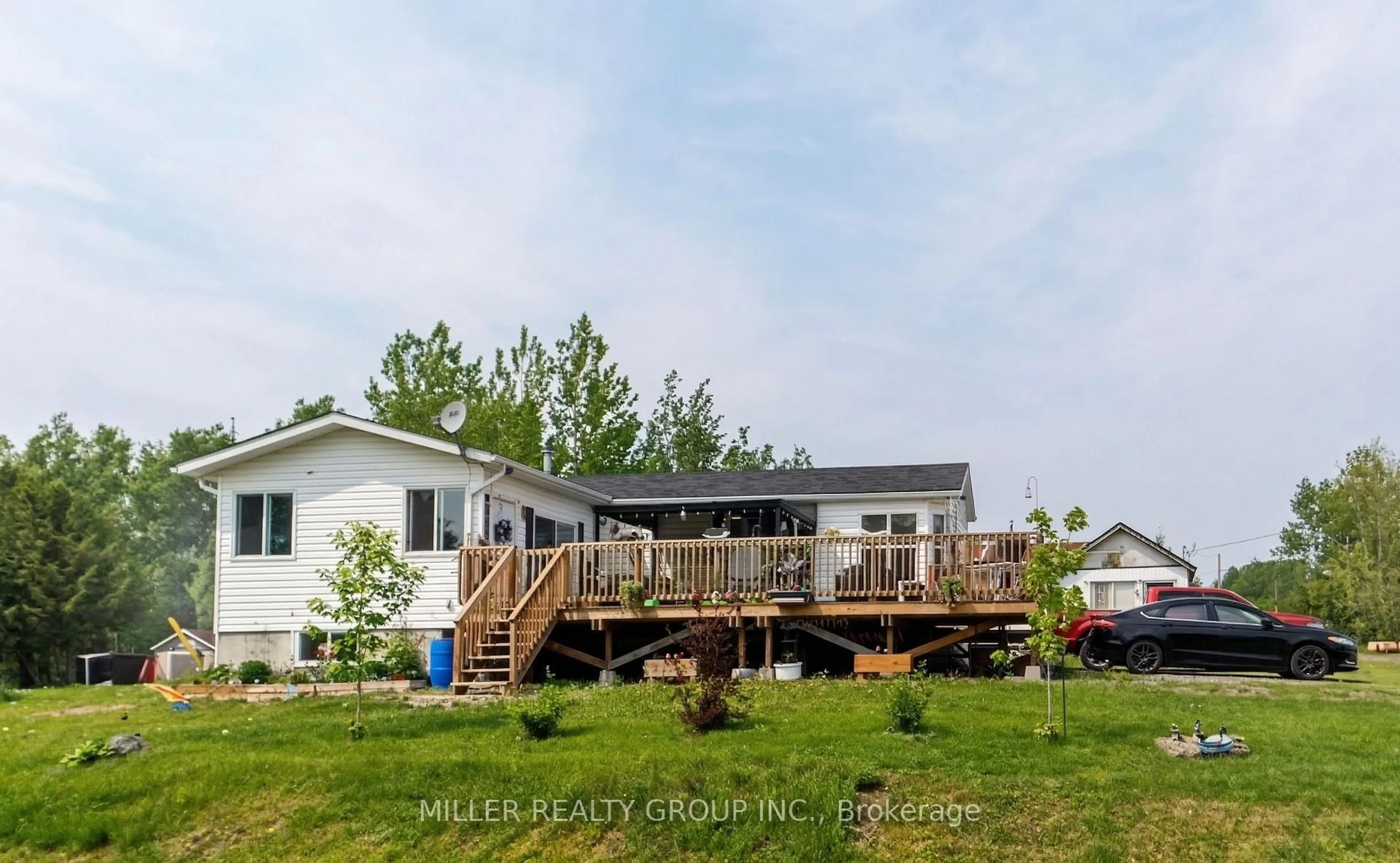 A pic from outside/outdoor area/front of a property/back of a property/a pic from drone, water/lake/river/ocean view for 50 Proulx St, Timiskaming Ontario P0J 1N0