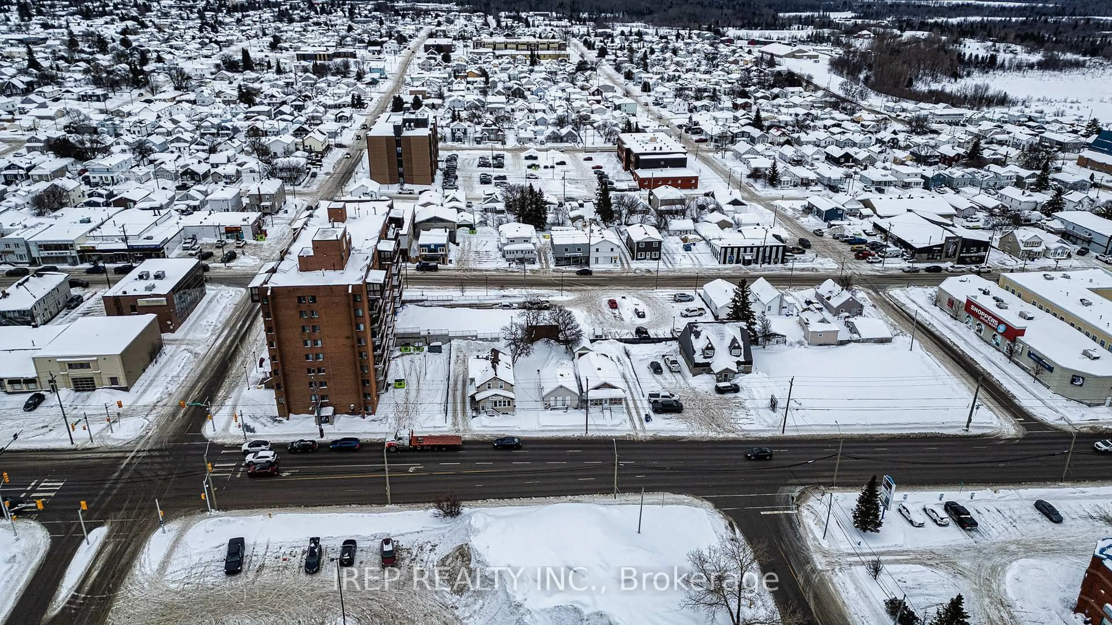 A pic from outside/outdoor area/front of a property/back of a property/a pic from drone, street for 165-169 Algonquin Blvd, Timmins Ontario P4N 2R6