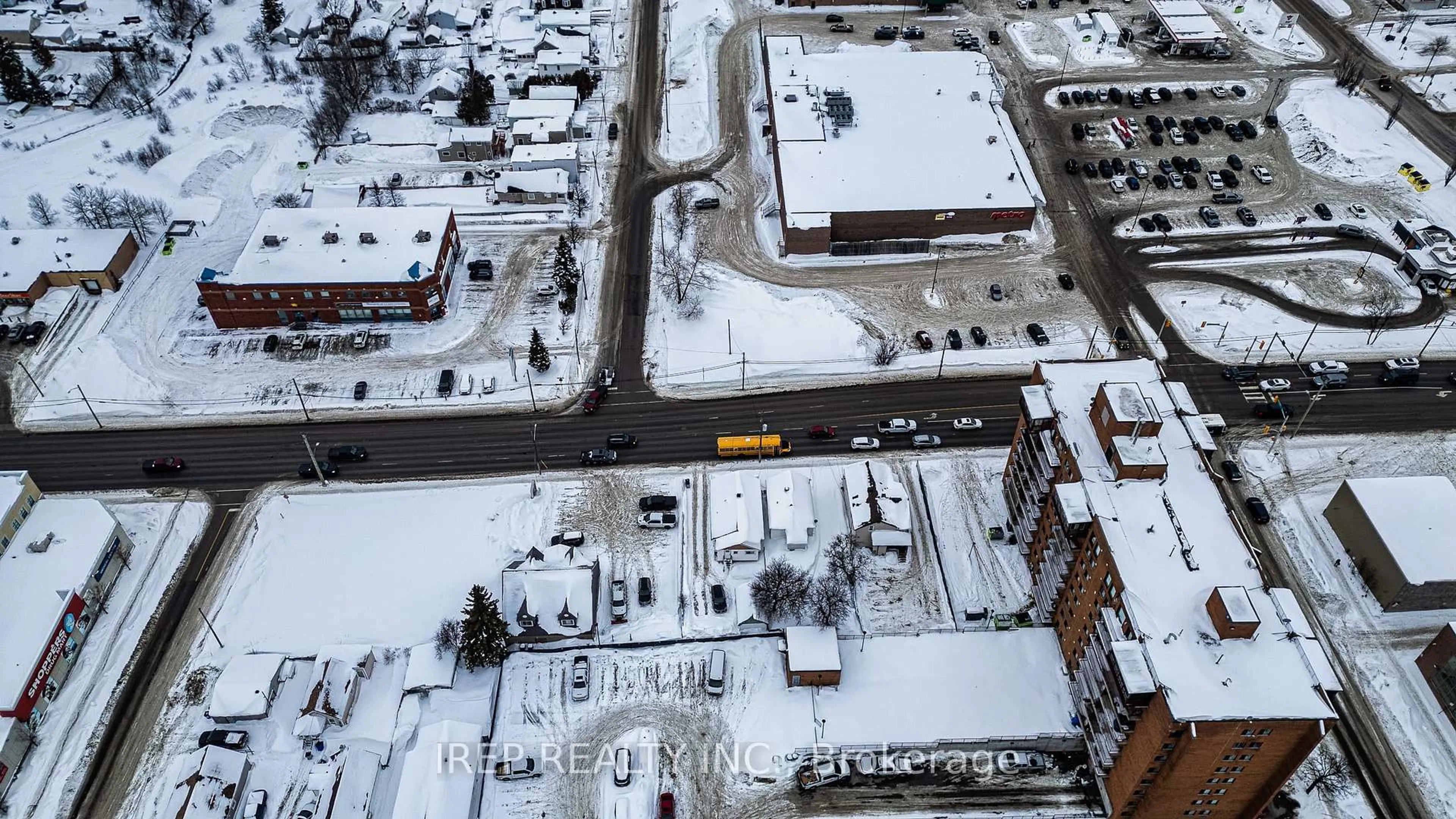 A pic from outside/outdoor area/front of a property/back of a property/a pic from drone, street for 165-169 Algonquin Blvd, Timmins Ontario P4N 2R6