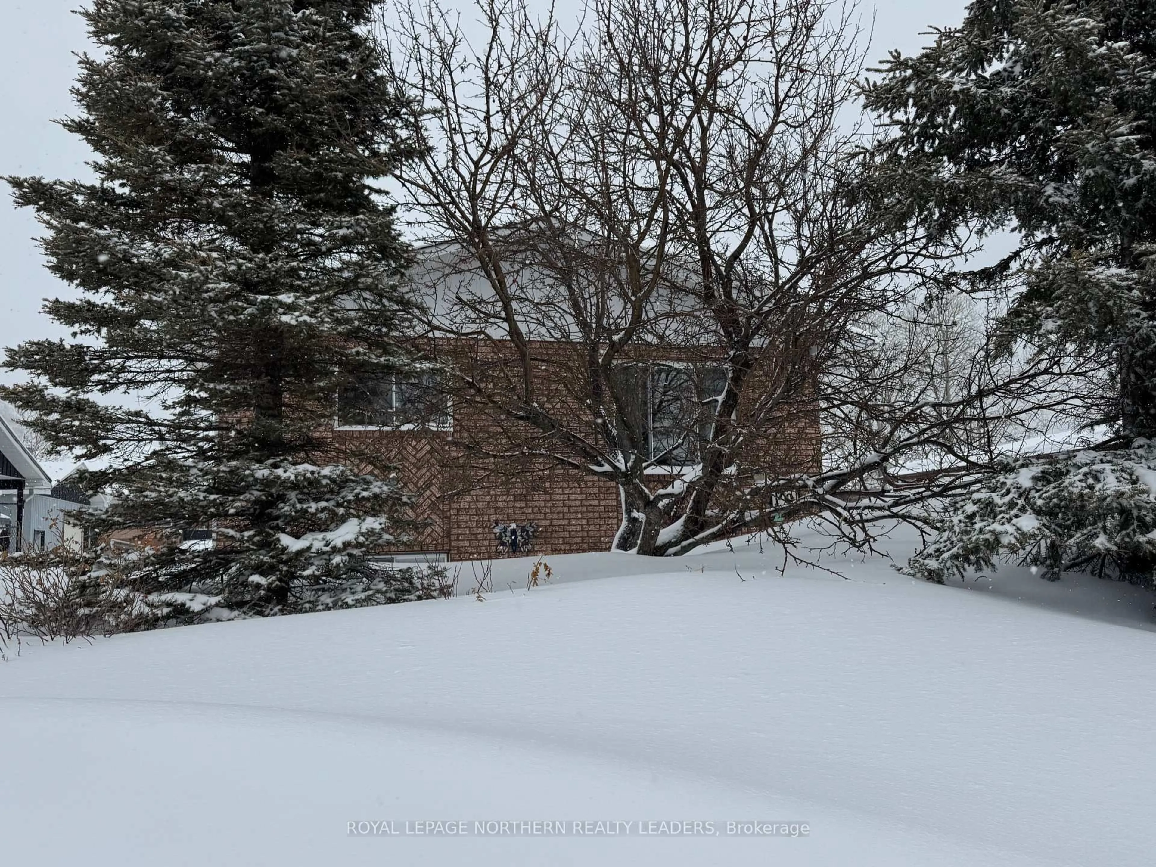 A pic from outside/outdoor area/front of a property/back of a property/a pic from drone, unknown for 70 Clifford Ave, Timmins Ontario P4R 1B6