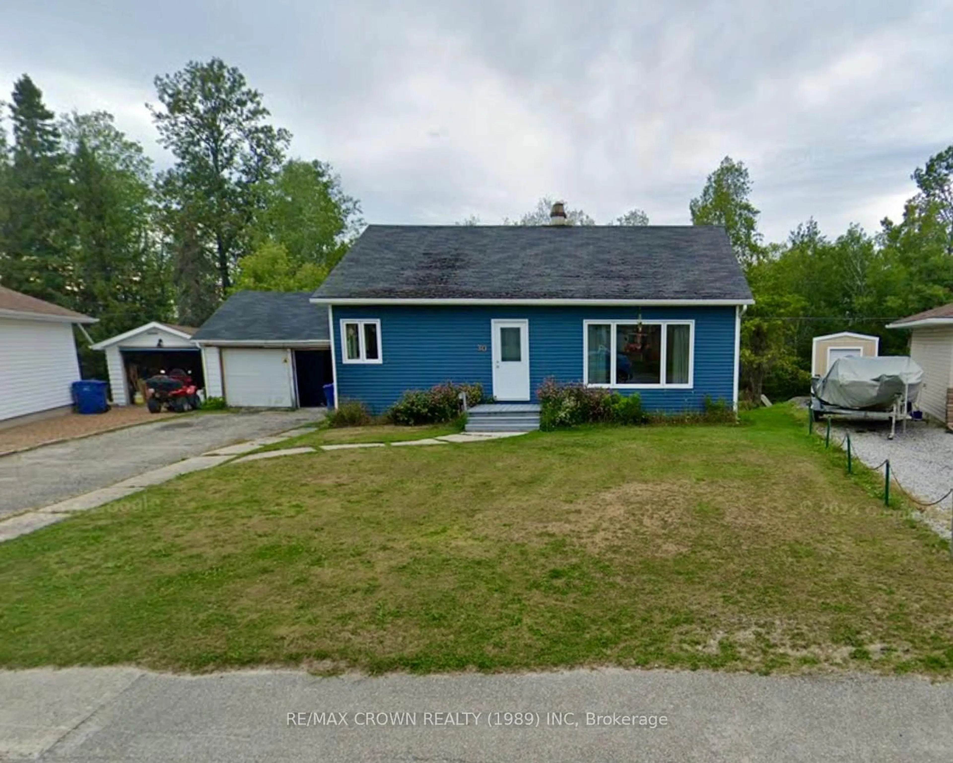 A pic from outside/outdoor area/front of a property/back of a property/a pic from drone, street for 30 Pine Cres, Kapuskasing Ontario P5N 1X7