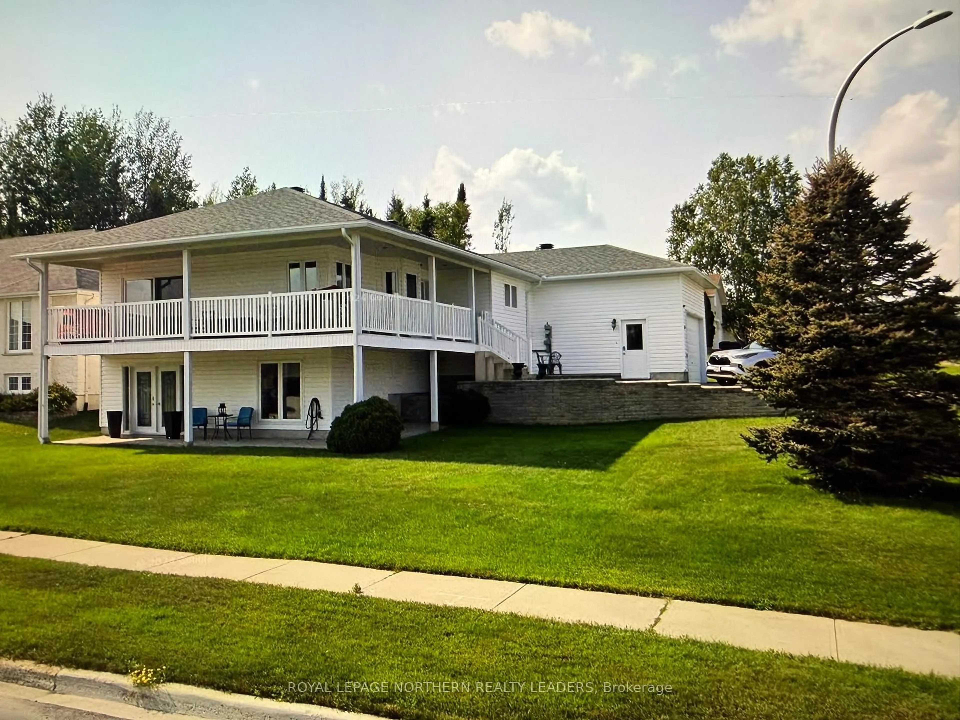 Home with vinyl exterior material, street for 15 Pleasant Ave, Timmins Ontario P4R 1M6