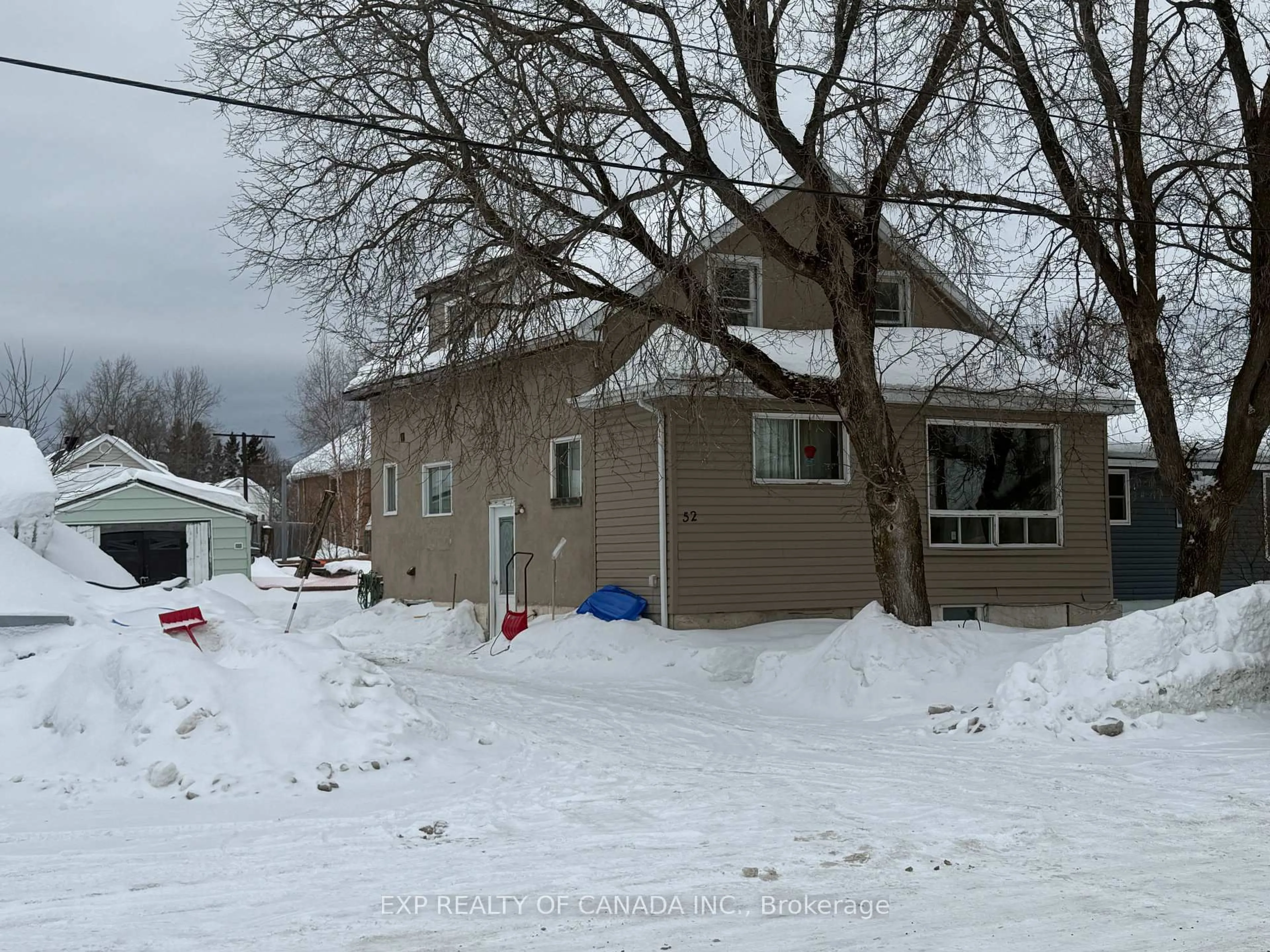 A pic from outside/outdoor area/front of a property/back of a property/a pic from drone, street for 52 Broadway Ave, Timmins Ontario P0N 1H0