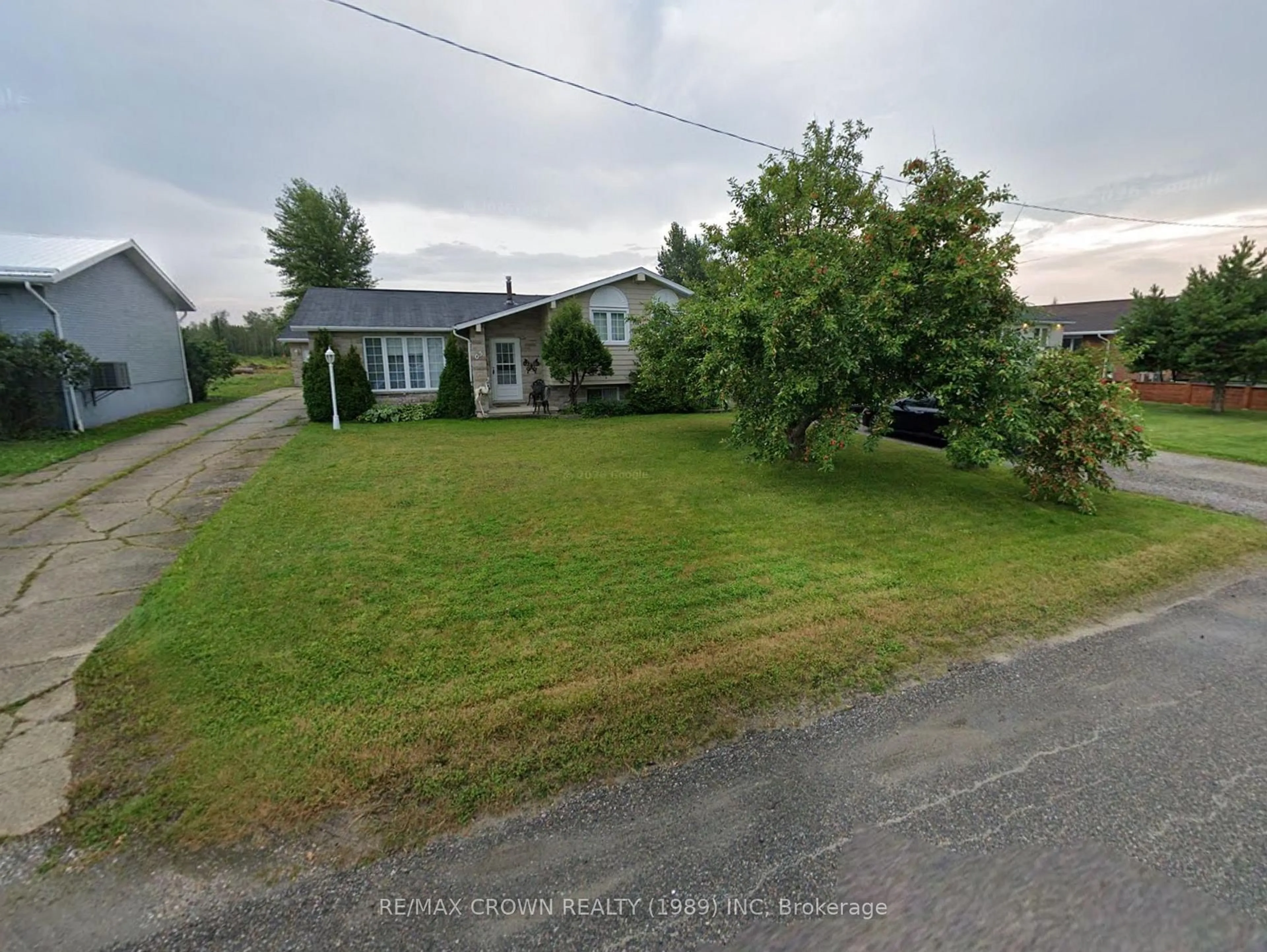 A pic from outside/outdoor area/front of a property/back of a property/a pic from drone, street for 5 Migneault Ave, Kapuskasing Ontario P5N 3G4