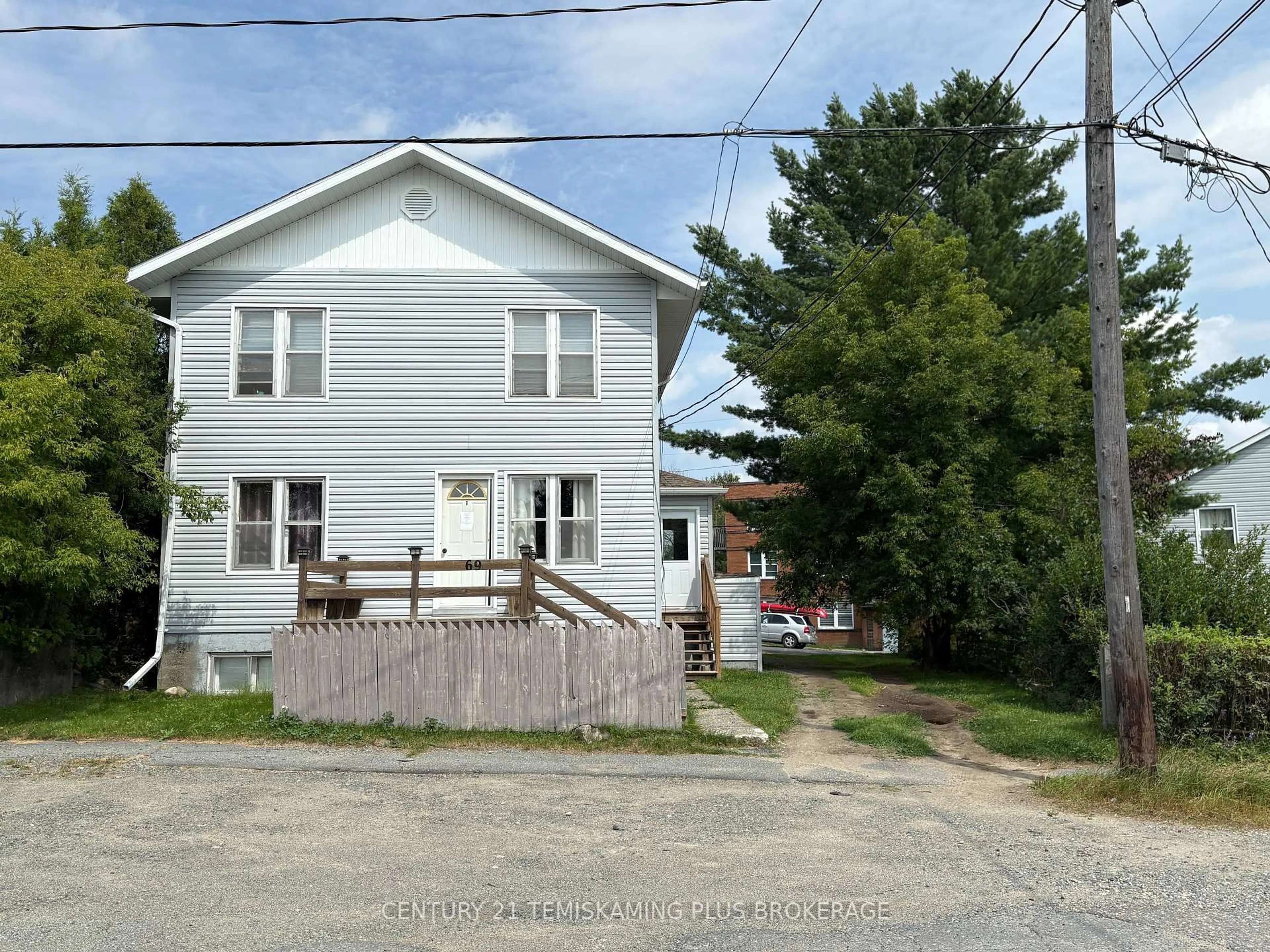 A pic from outside/outdoor area/front of a property/back of a property/a pic from drone, street for 69 McCamus Ave, Kirkland Lake Ontario P2N 2J8