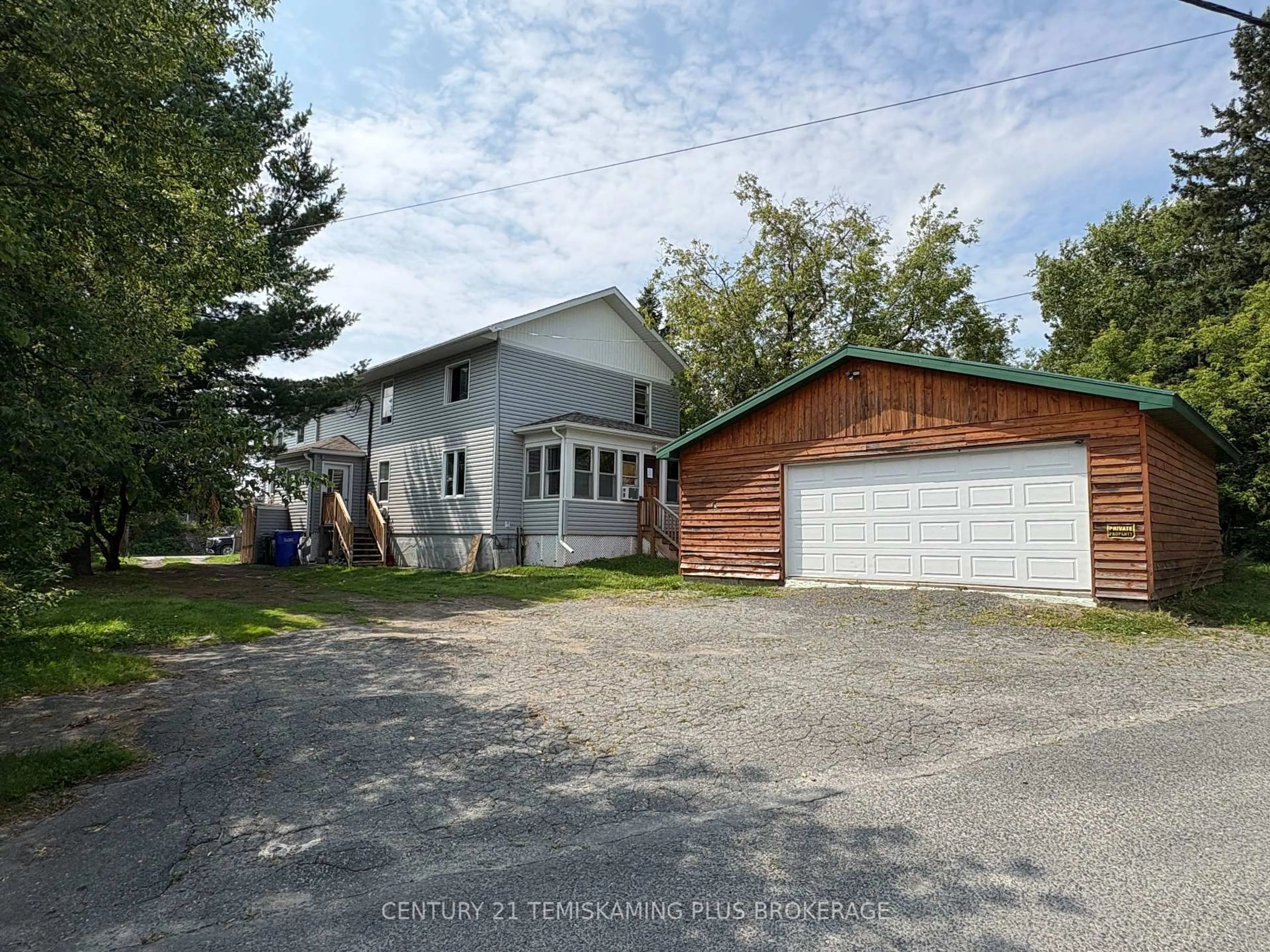 A pic from outside/outdoor area/front of a property/back of a property/a pic from drone, street for 69 McCamus Ave, Kirkland Lake Ontario P2N 2J8
