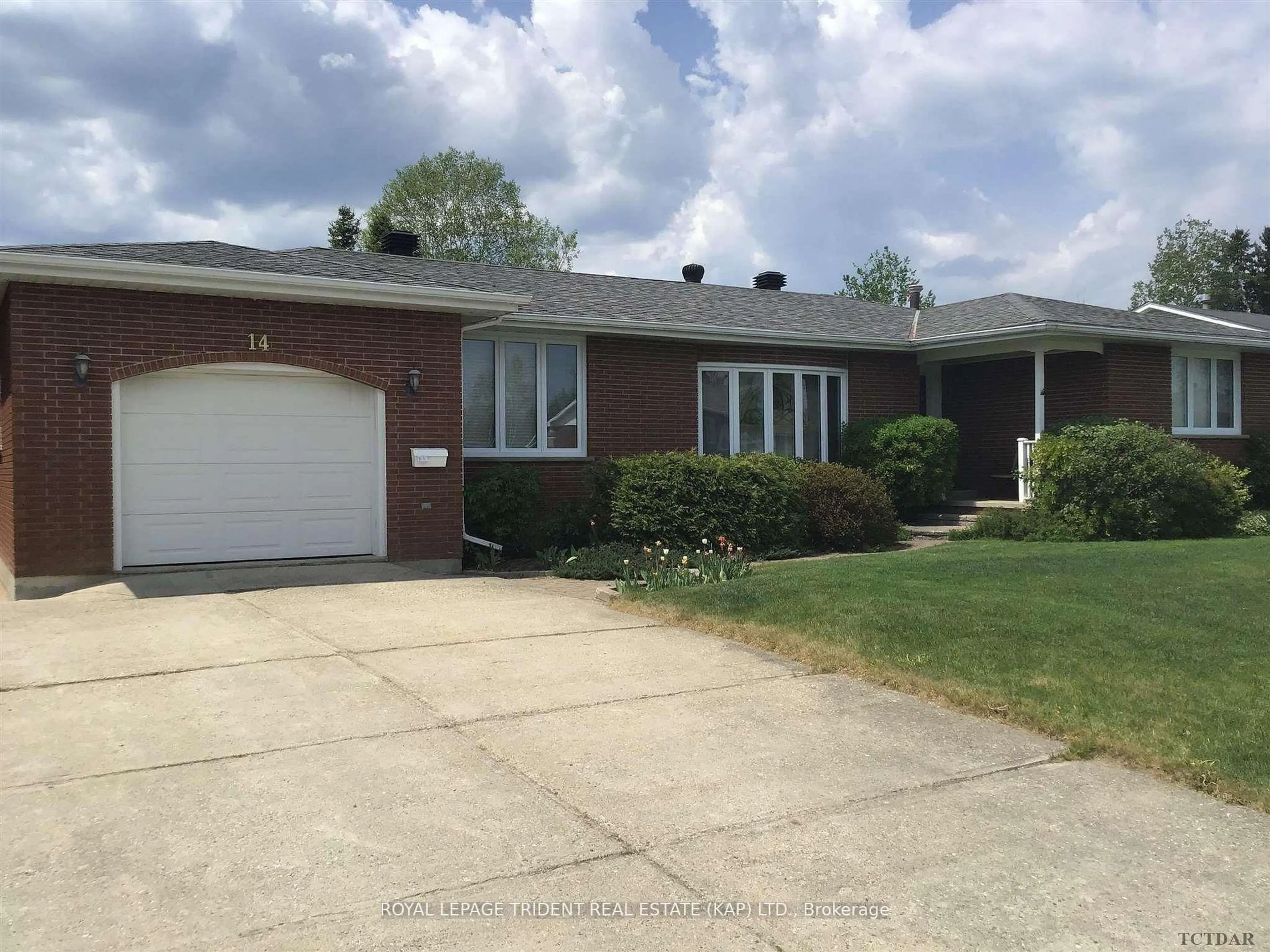 Home with brick exterior material, street for 14 Kennedy Ave, Kapuskasing Ontario P5N 1M2