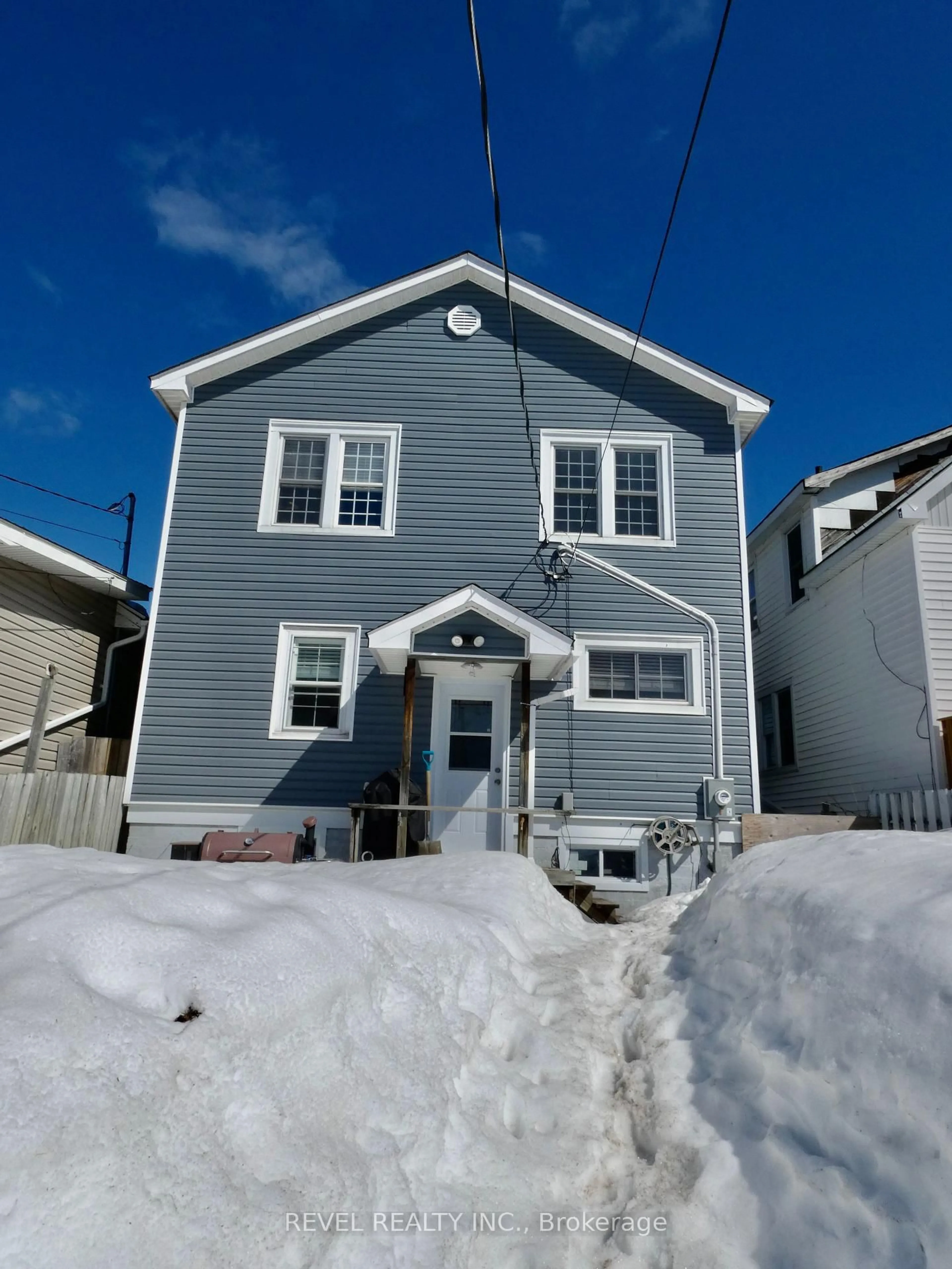 Home with vinyl exterior material, street for 219 Cherry St, Timmins Ontario P4N 6W3