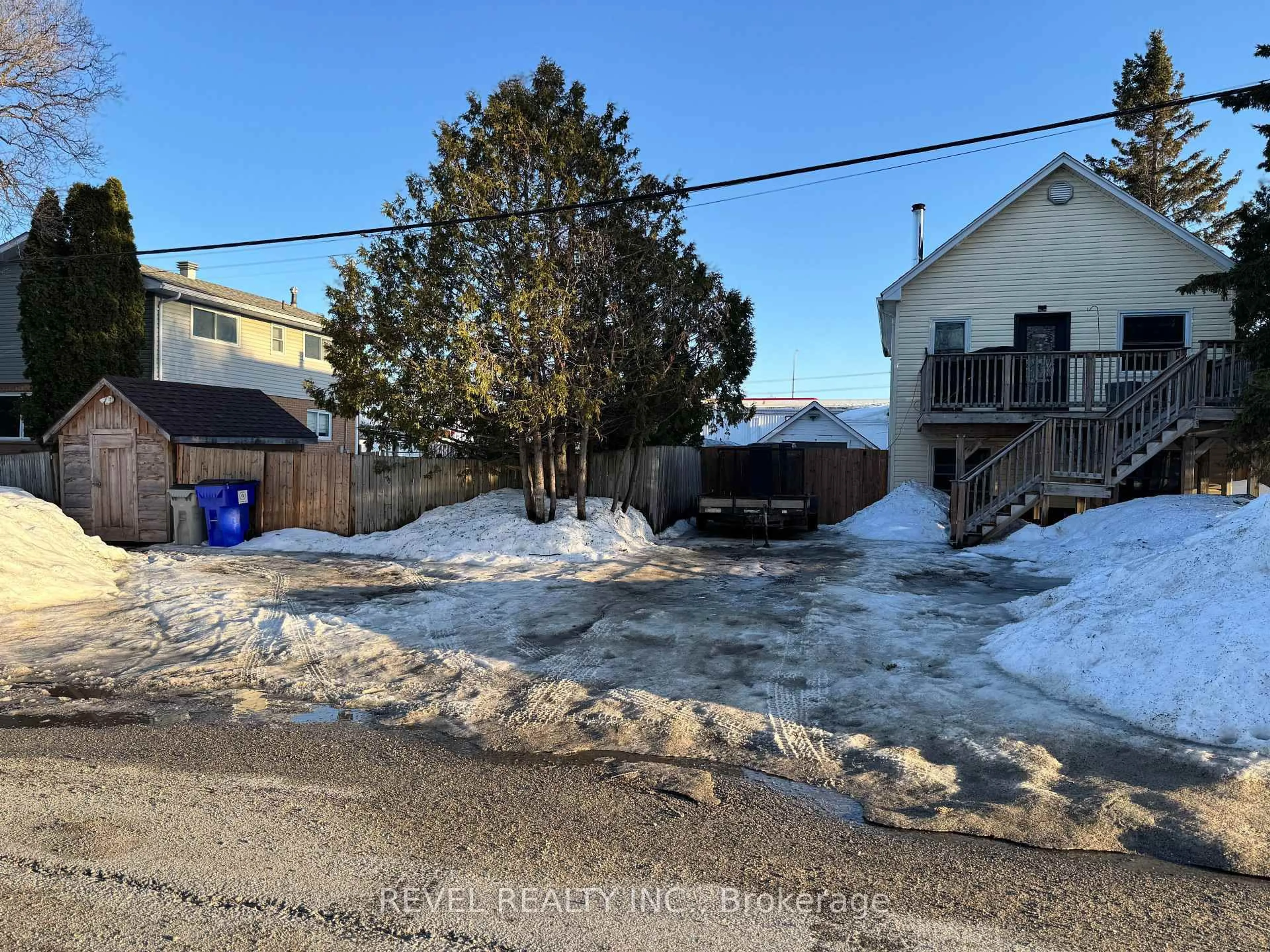 A pic from outside/outdoor area/front of a property/back of a property/a pic from drone, street for 77 Fern Ave, Timmins Ontario P0N 1H0