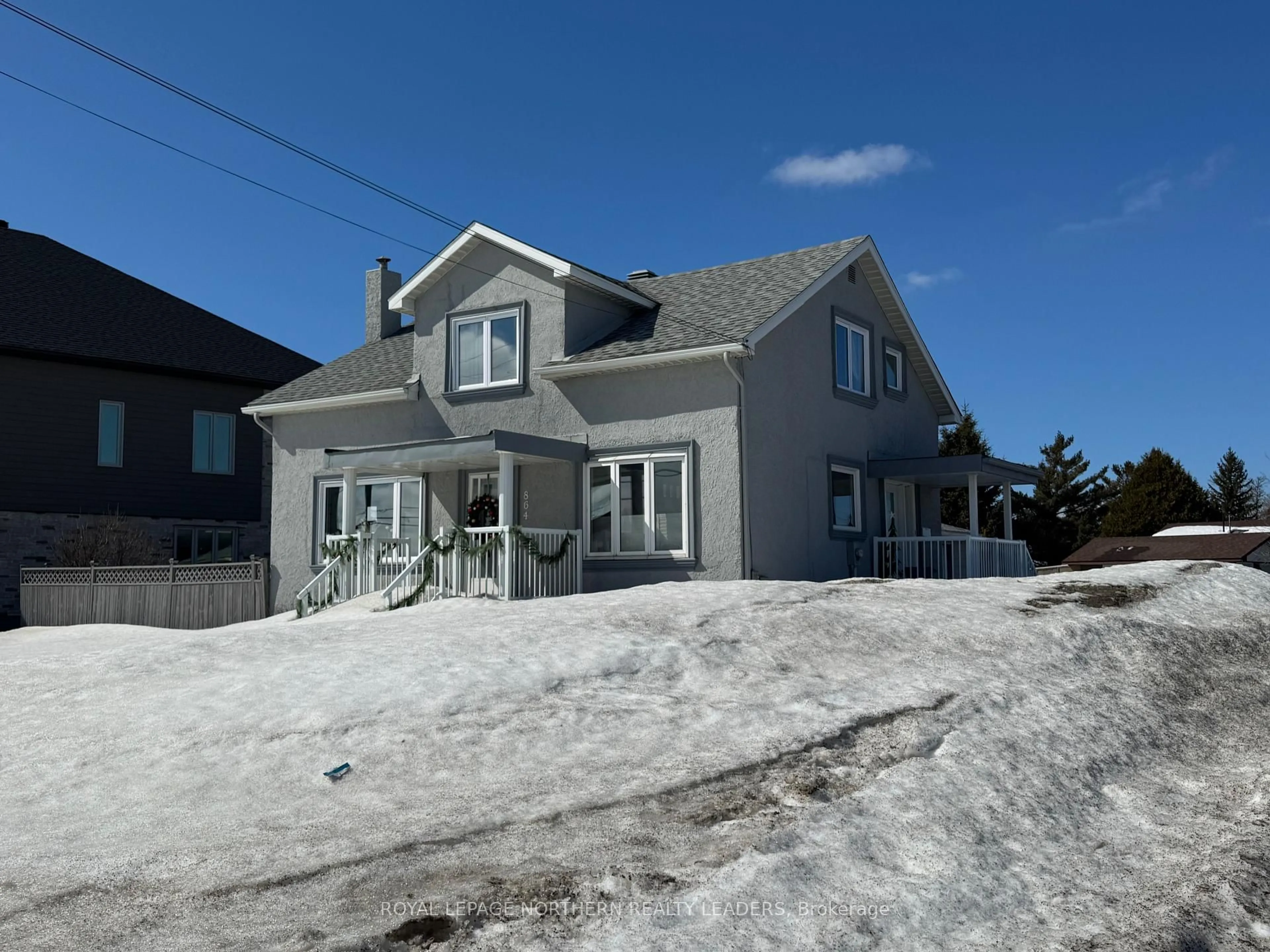 A pic from outside/outdoor area/front of a property/back of a property/a pic from drone, street for 864 Riverside Dr, Timmins Ontario P4N 3W2