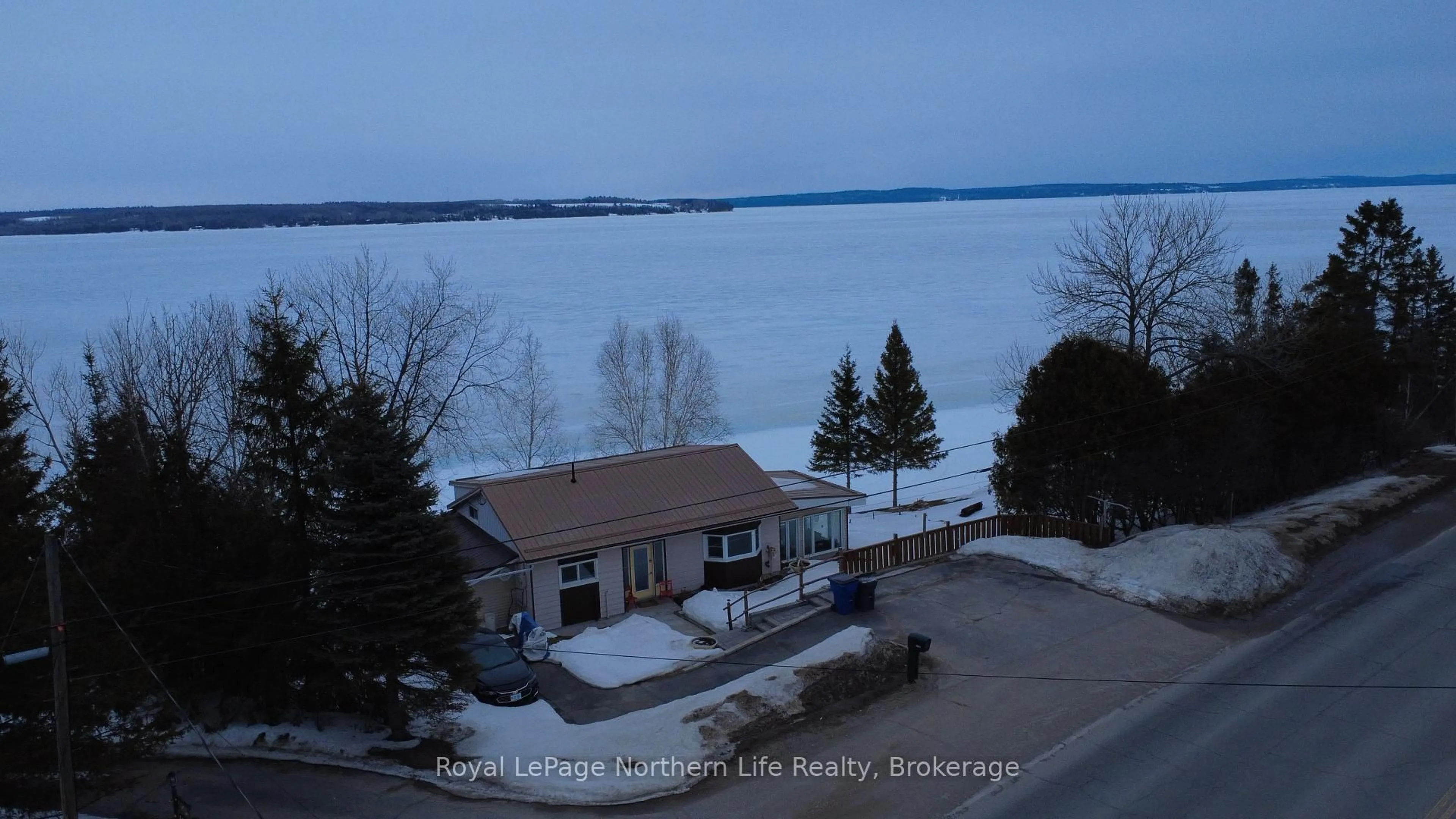 A pic from outside/outdoor area/front of a property/back of a property/a pic from drone, water/lake/river/ocean view for 1017 LAKESHORE Rd, Temiskaming Shores Ontario P0J 1K0