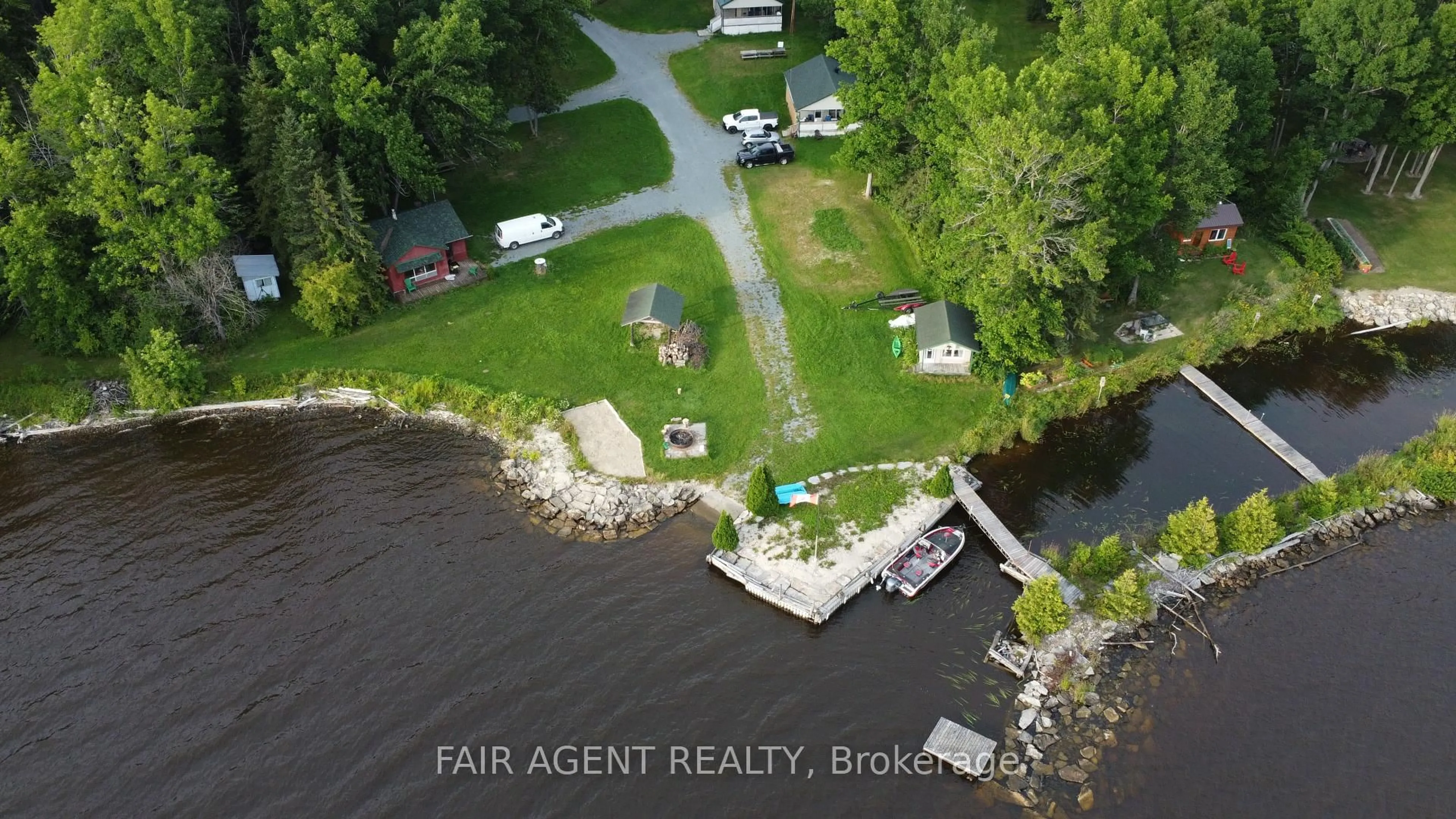 A pic from outside/outdoor area/front of a property/back of a property/a pic from drone, water/lake/river/ocean view for 743022 & 743024 Dawson Point Rd, Timiskaming Ontario P0J 1P0