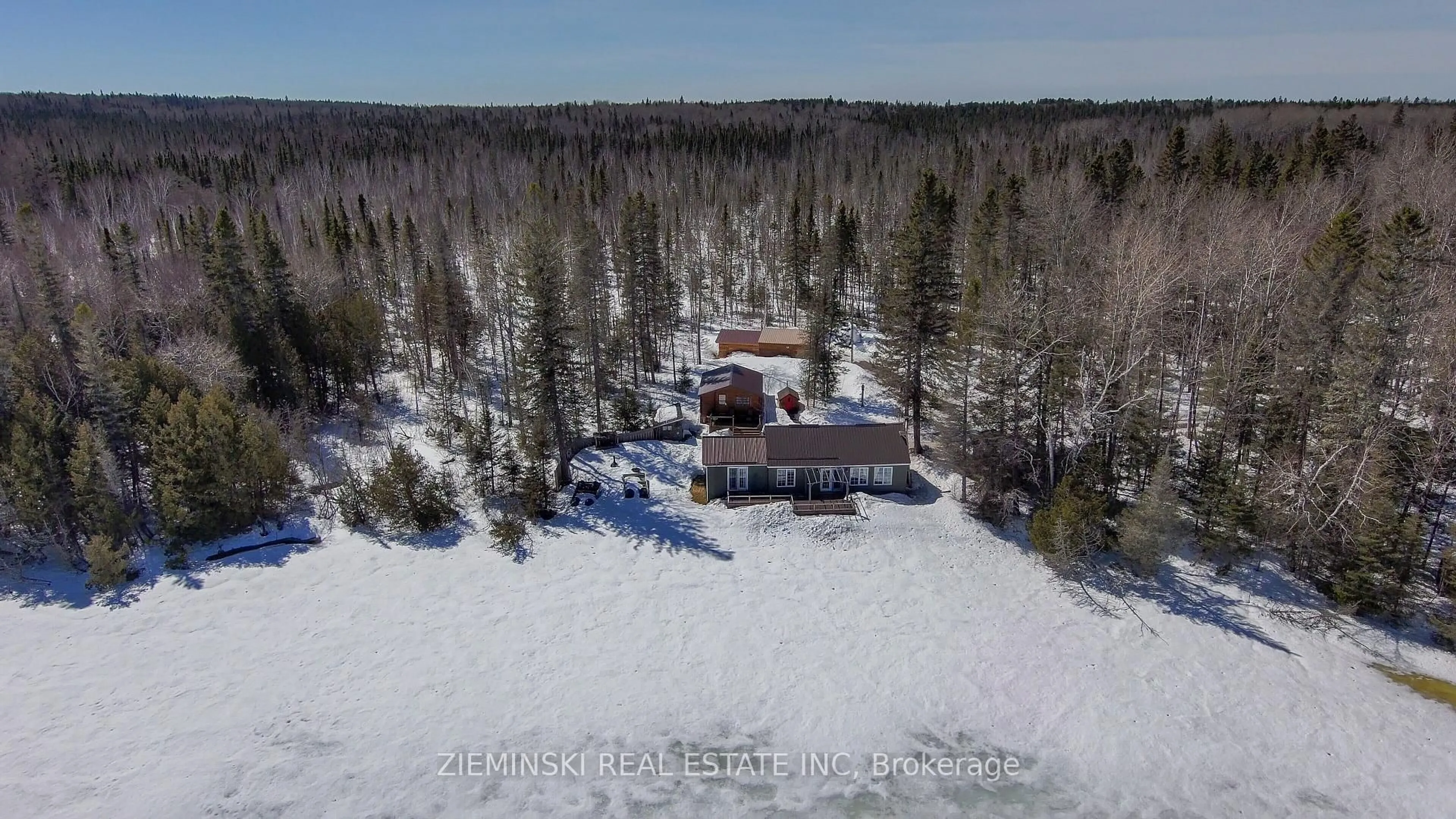 A pic from outside/outdoor area/front of a property/back of a property/a pic from drone, unknown for 520 West Sesekinika Rd, Kirkland Lake Ontario P0K 1T0
