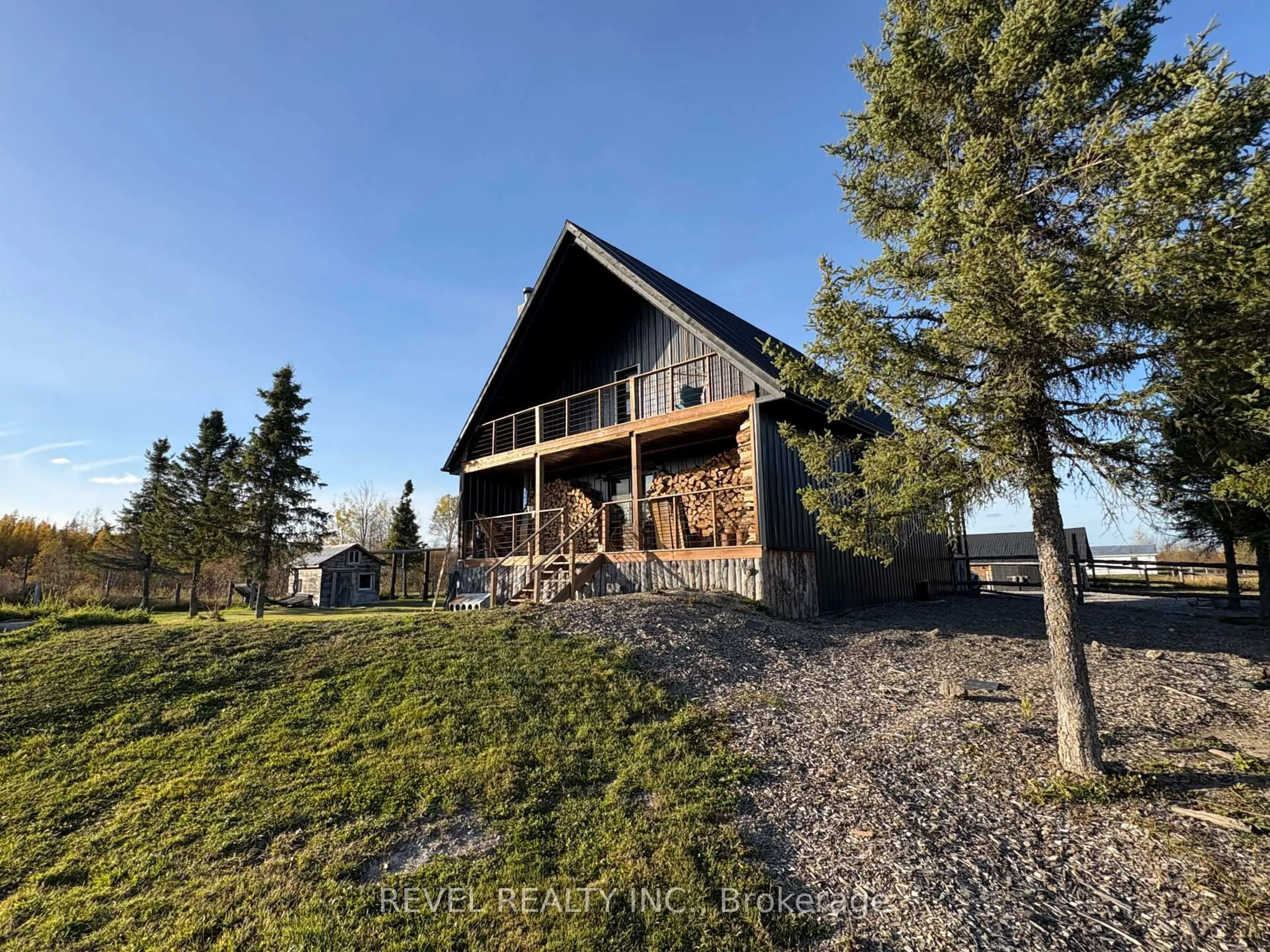 A pic from outside/outdoor area/front of a property/back of a property/a pic from drone, mountain view for 680 Peltola Rd, Cochrane Ontario P0L 1C0