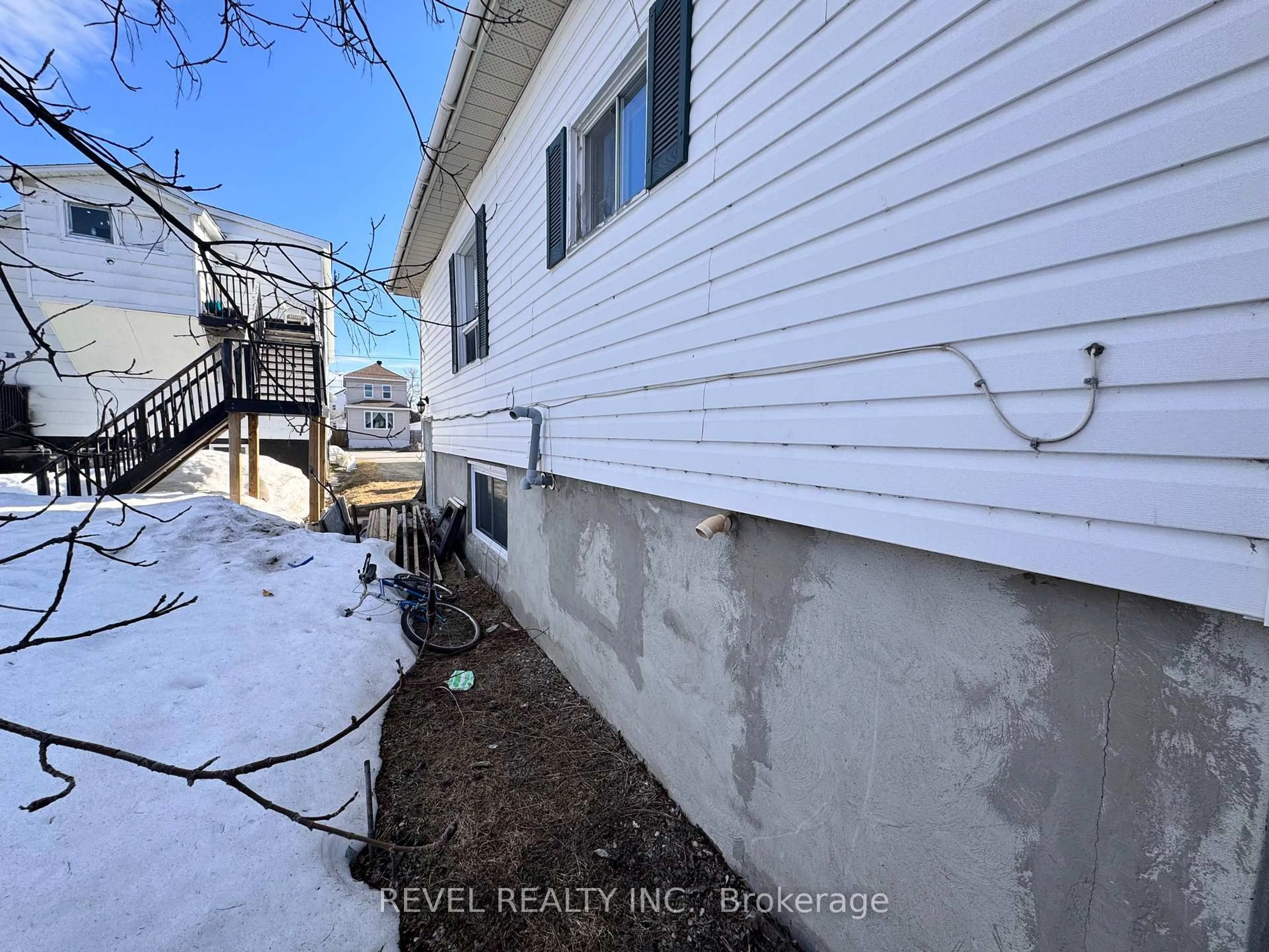 A pic from outside/outdoor area/front of a property/back of a property/a pic from drone, unknown for 132 Bruce Ave, Timmins Ontario P0N 1H0
