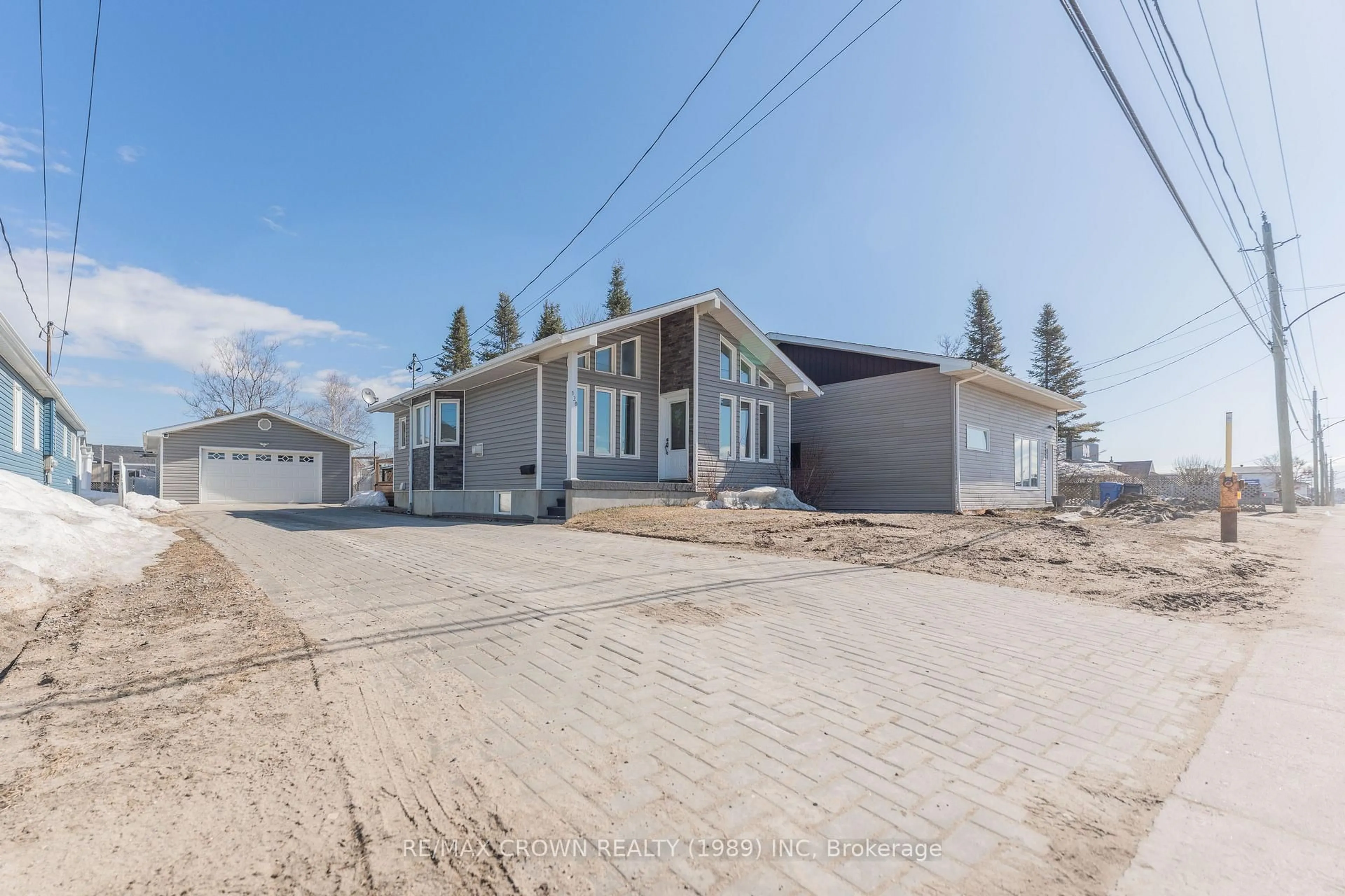 A pic from outside/outdoor area/front of a property/back of a property/a pic from drone, street for 120 Government Rd, Kapuskasing Ontario P5N 2W8